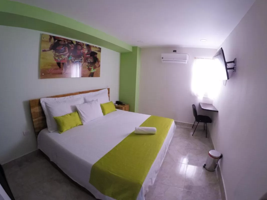 Bed in Kamaleb Farallones Hotel
