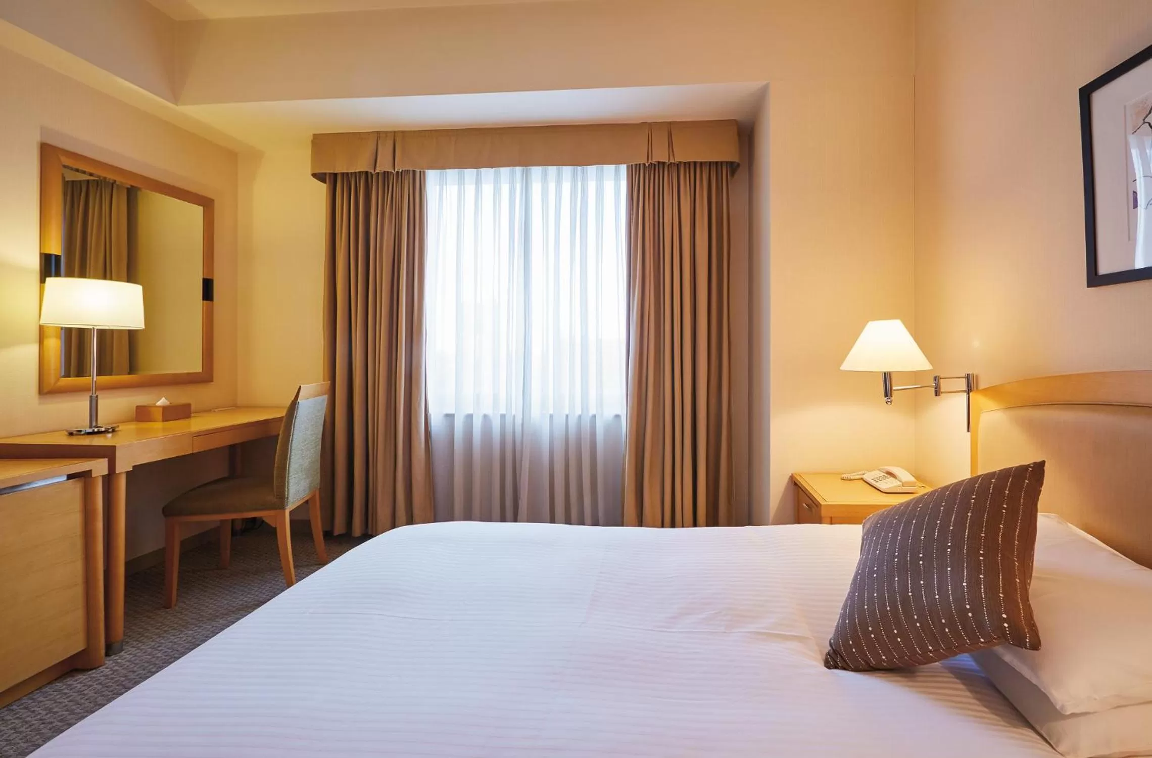 Bed in Royal Pines Hotel Urawa