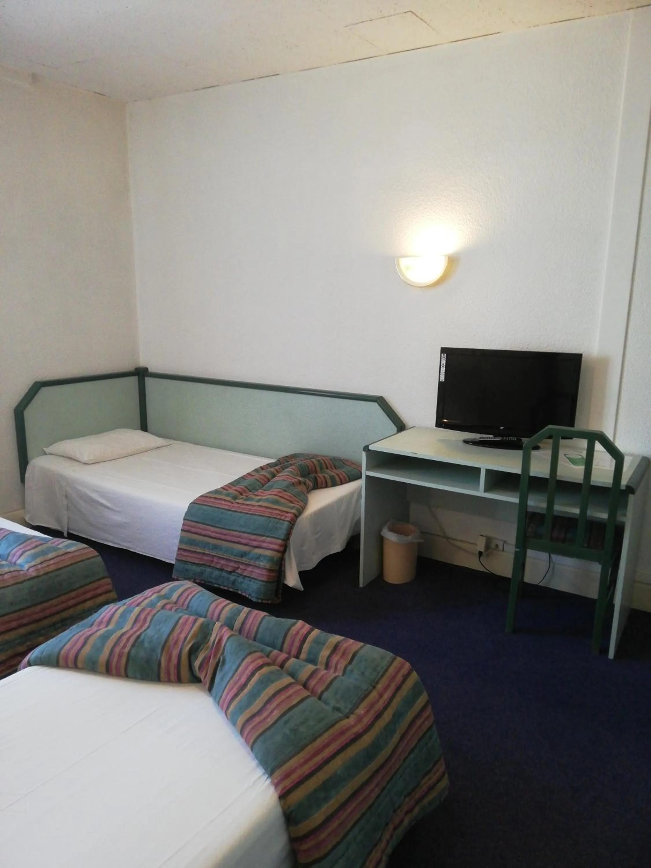 Bed in Hôtel de Nevers