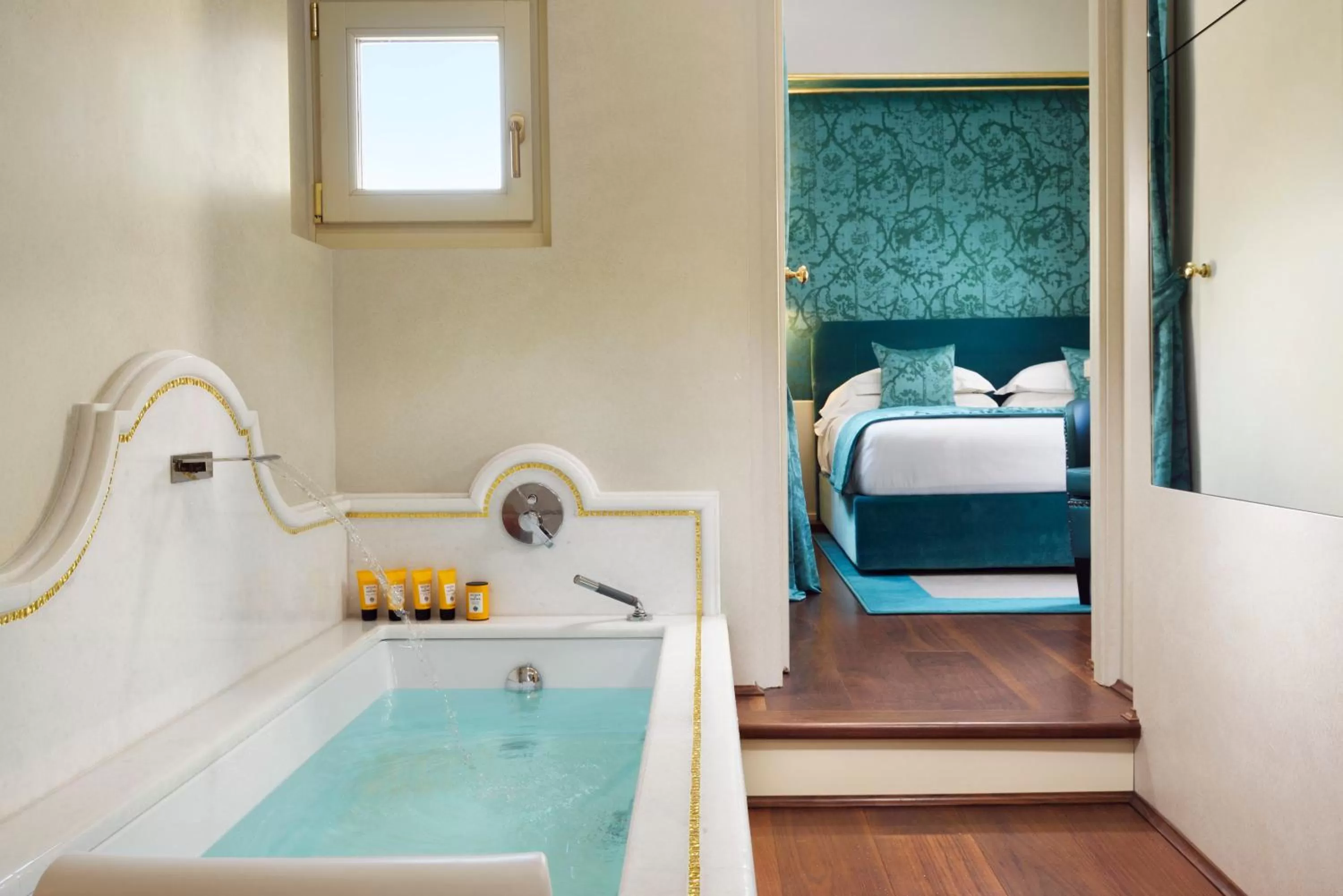 Bathroom, Bed in San Firenze Suites & Spa