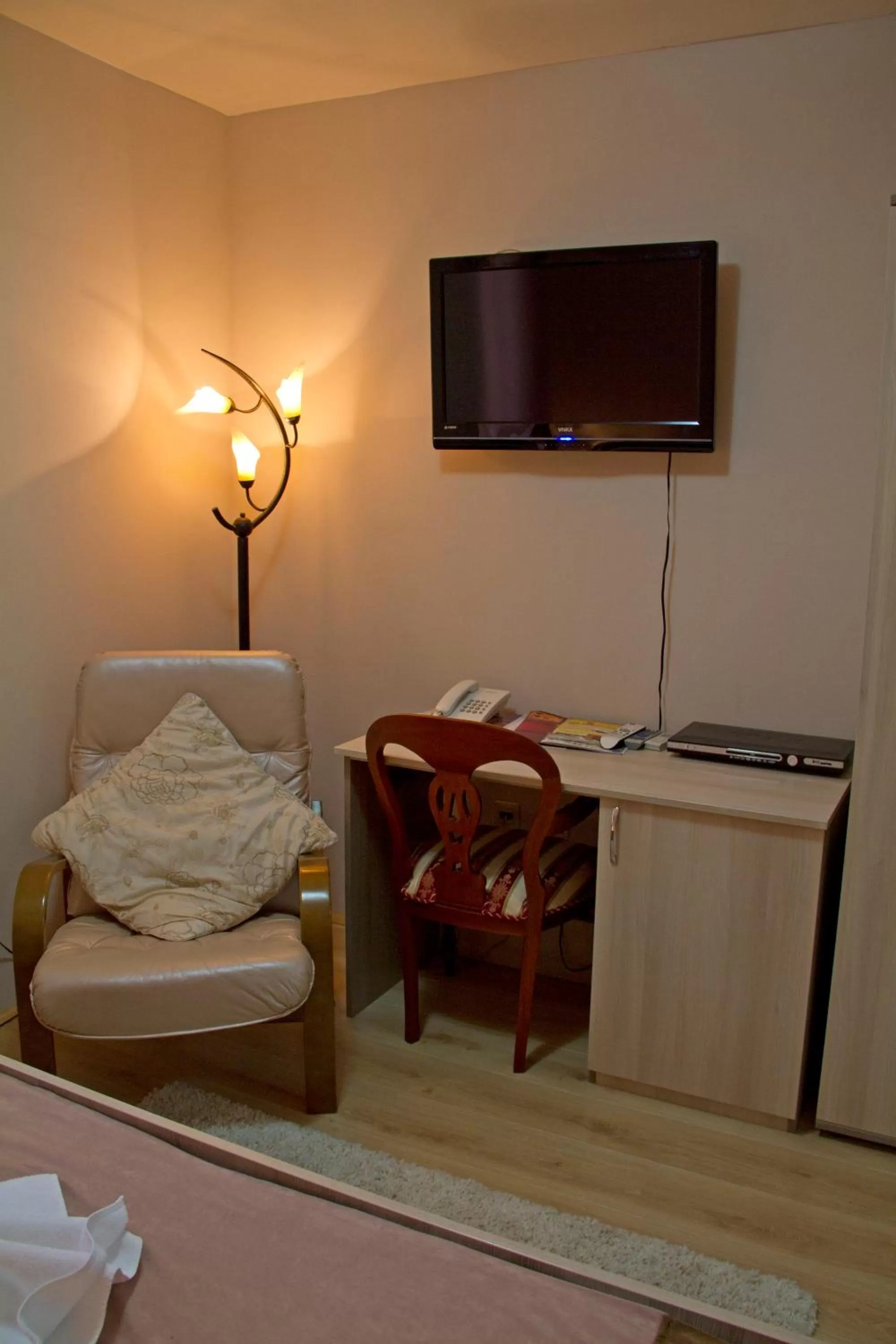 Decorative detail, TV/Entertainment Center in Garni Hotel Tri O