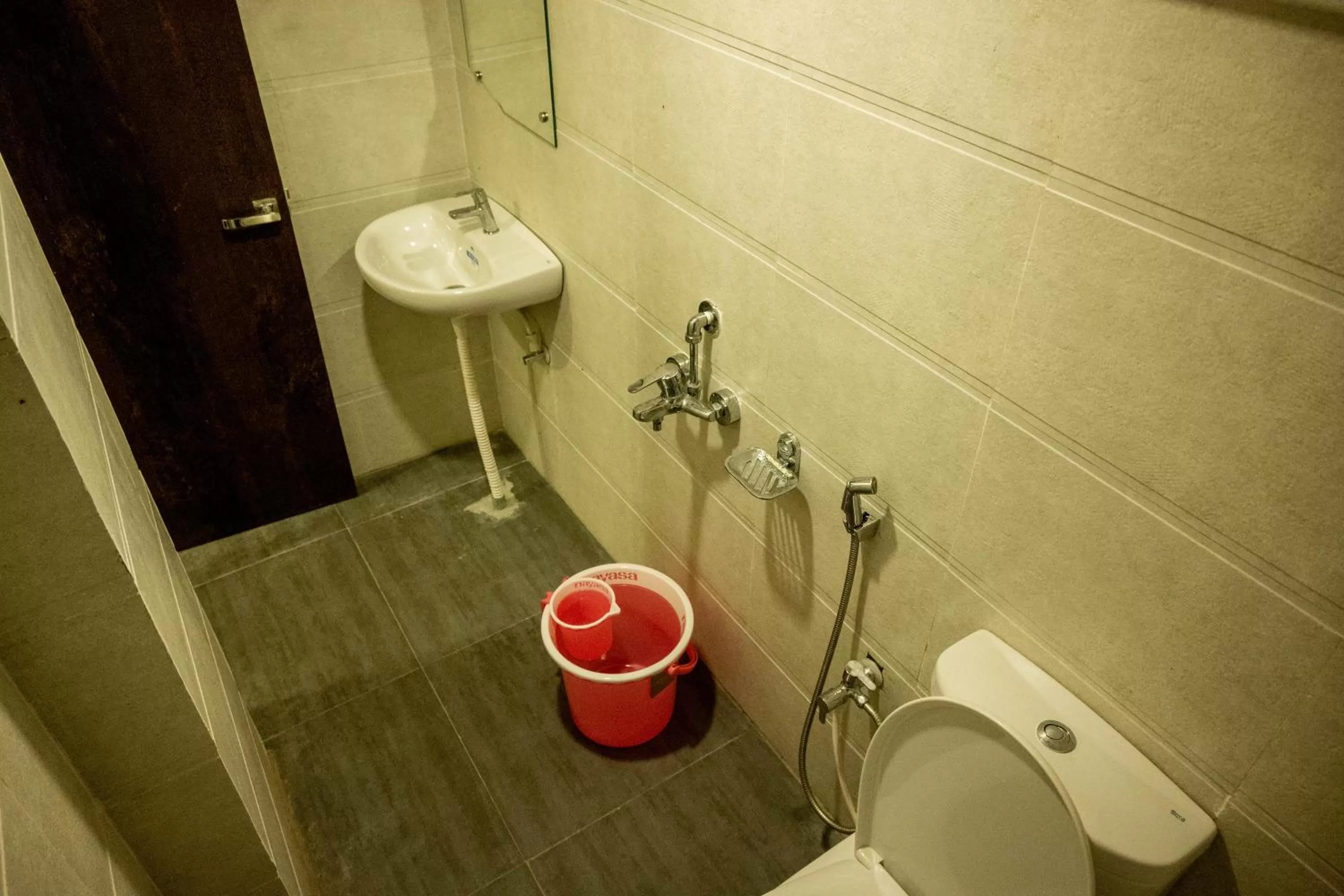 Bathroom in Vinayak Bhavan By Vinayak Hotels