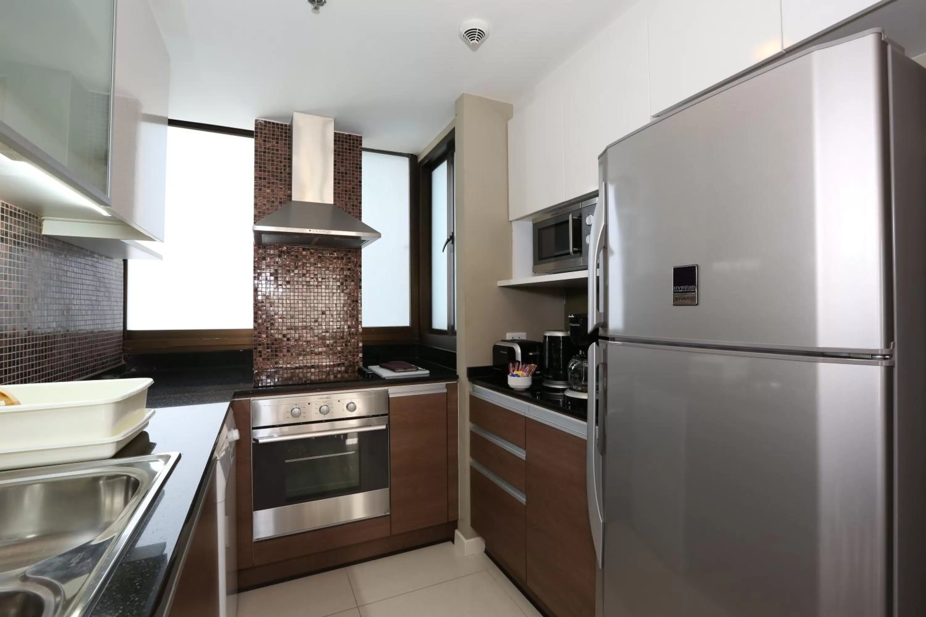 Kitchen or kitchenette in Bangna Pride Hotel & Residence