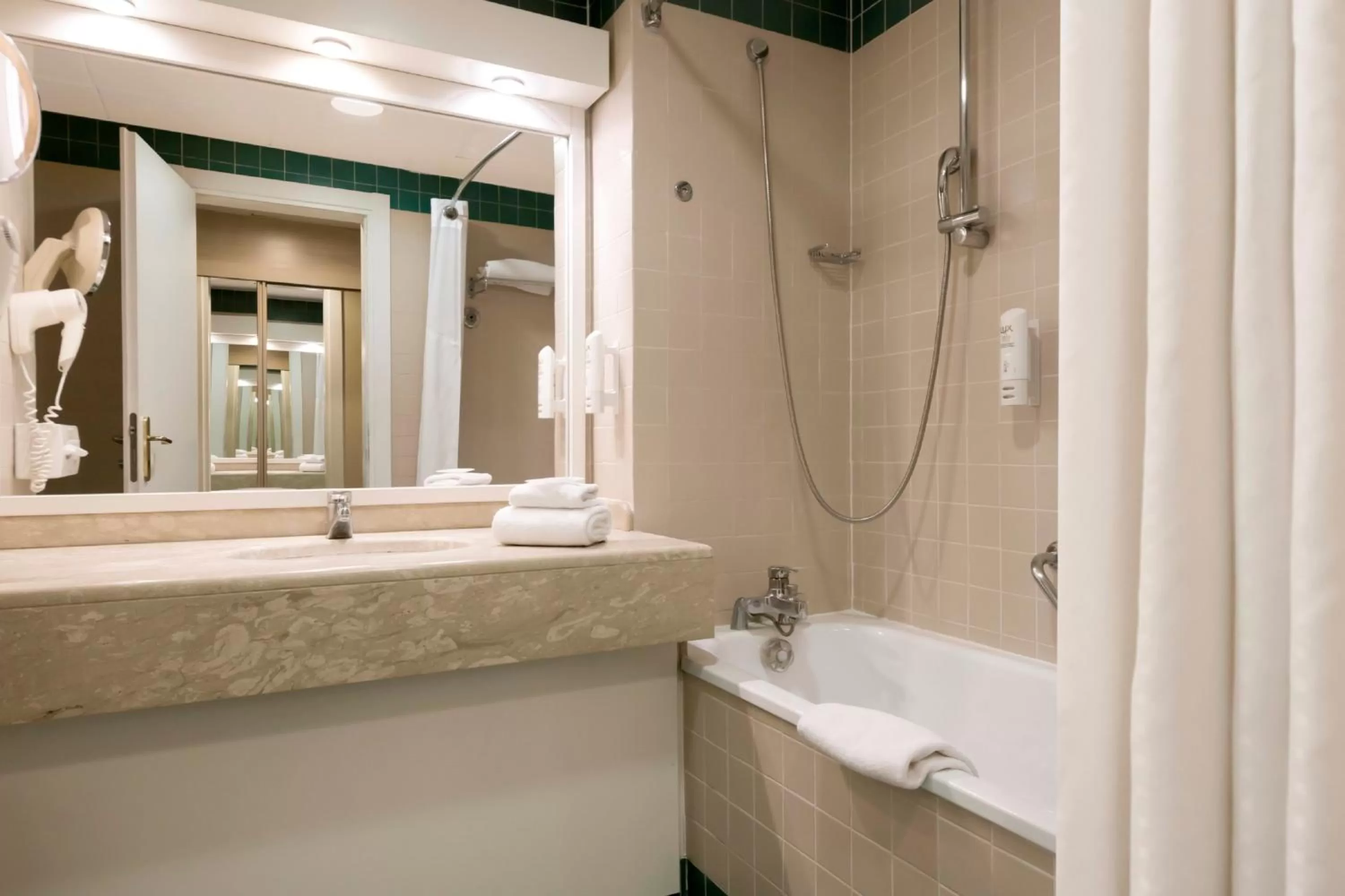 Bathroom in Holiday Inn Naples by IHG