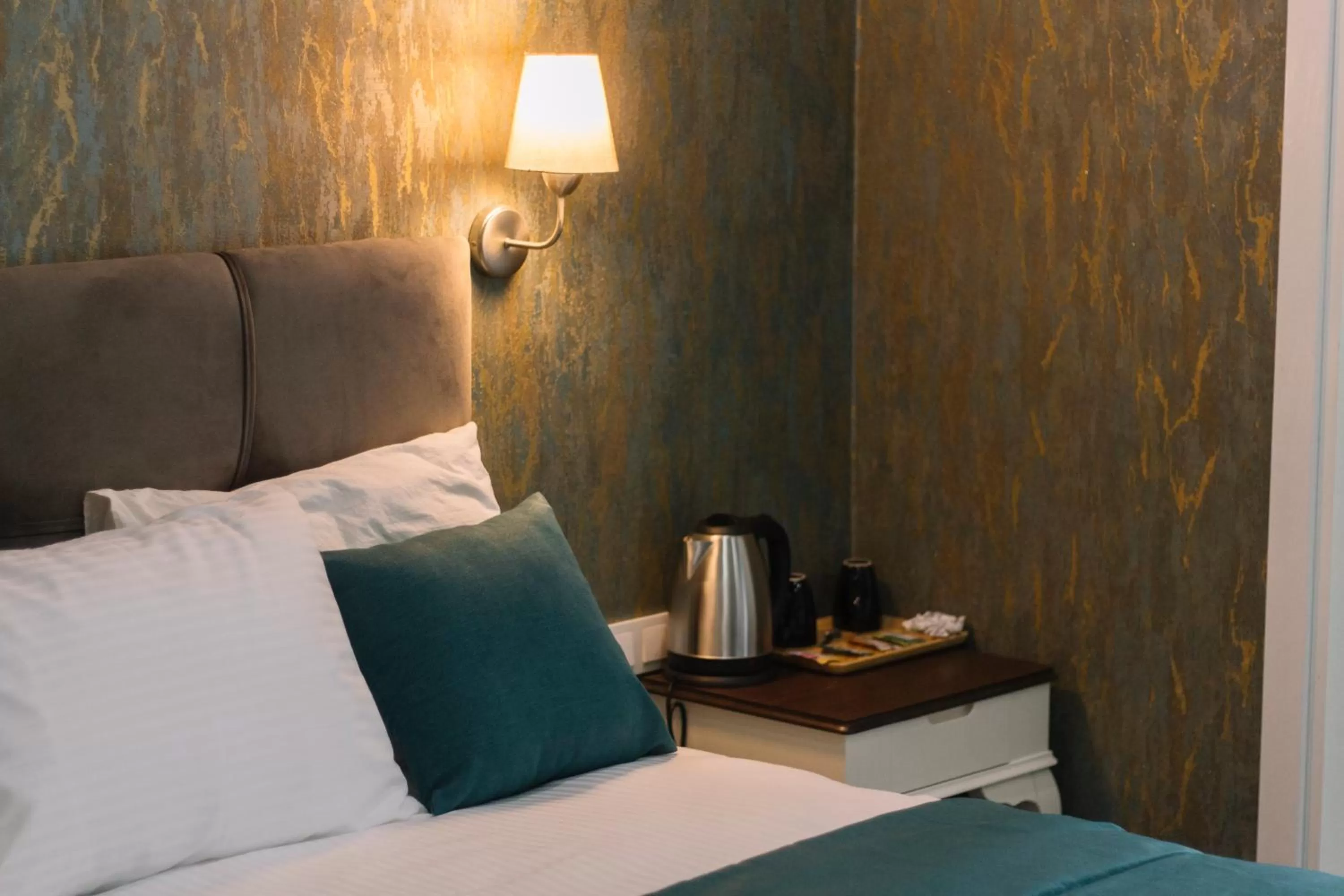 Bed in Melrose Pansiyon