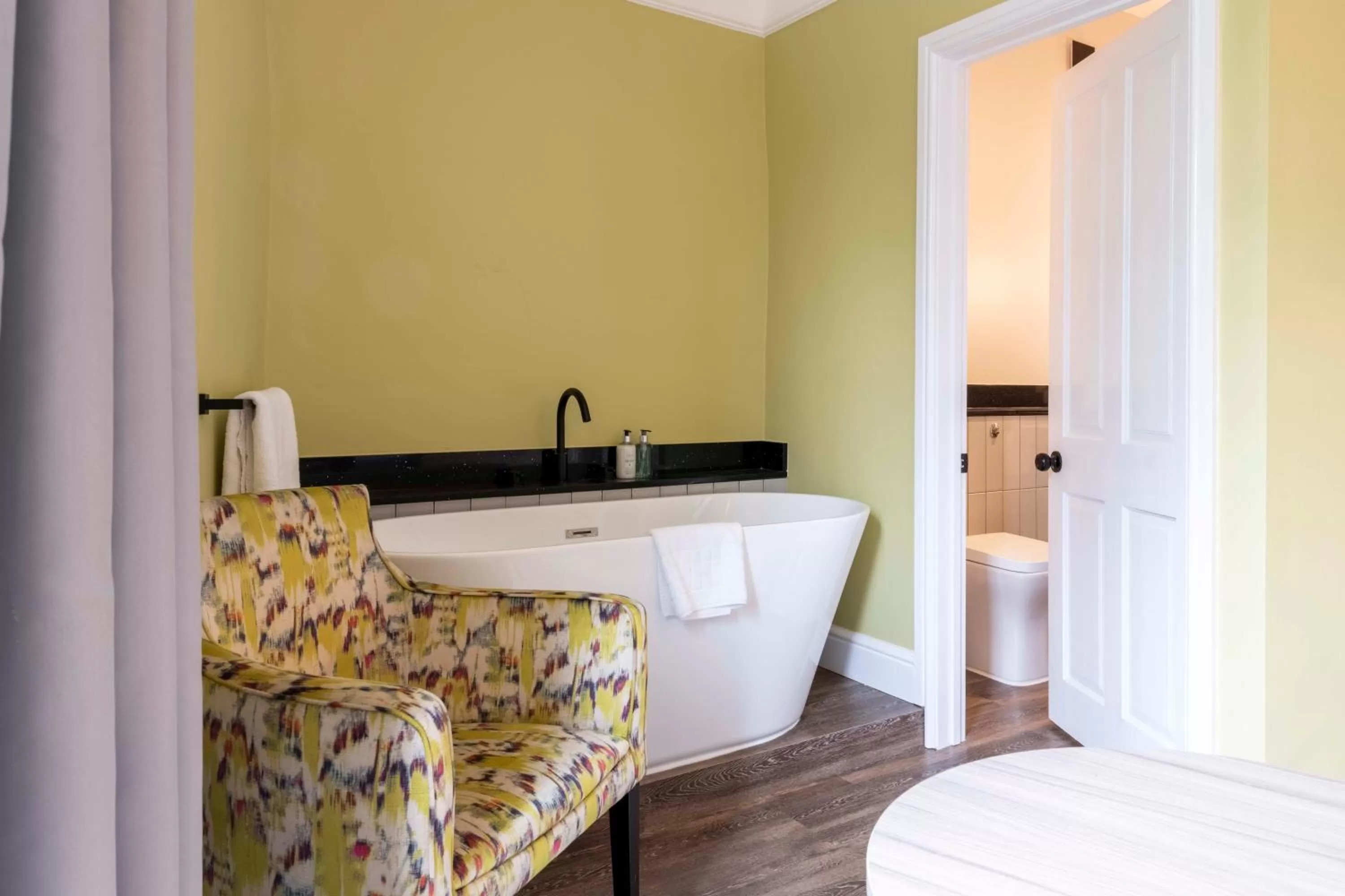 Bathroom, Bed in Wisteria Hotel