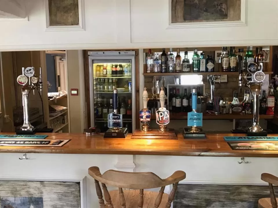 Lounge or bar in The Coach House Inn