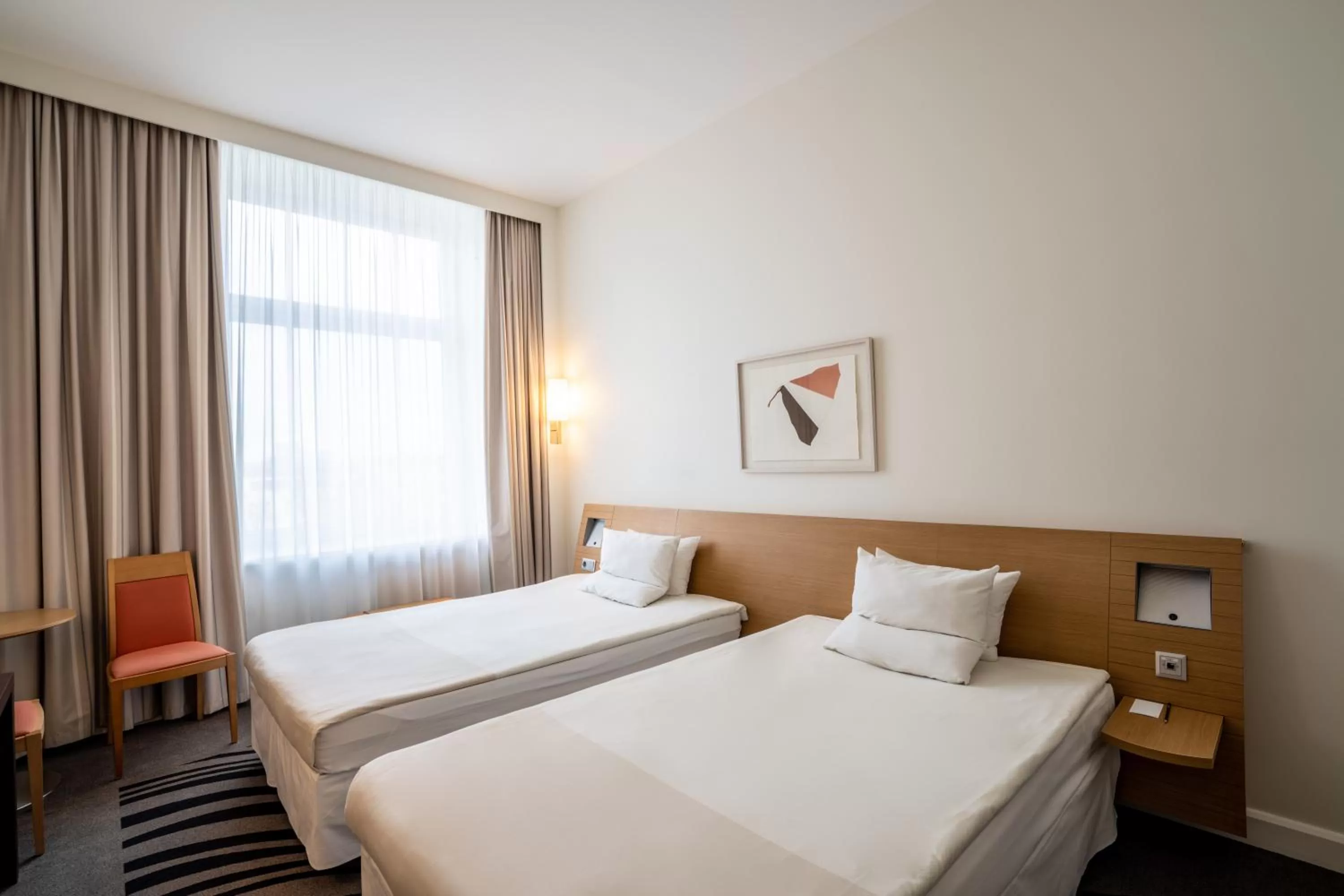Property building, Bed in Novotel Vilnius Centre