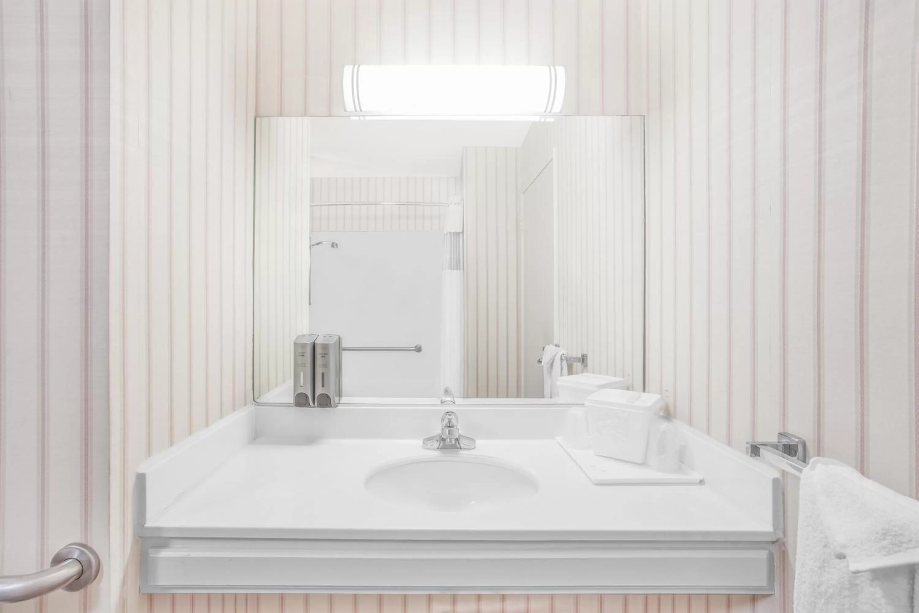 Bathroom in Ramada by Wyndham Barstow