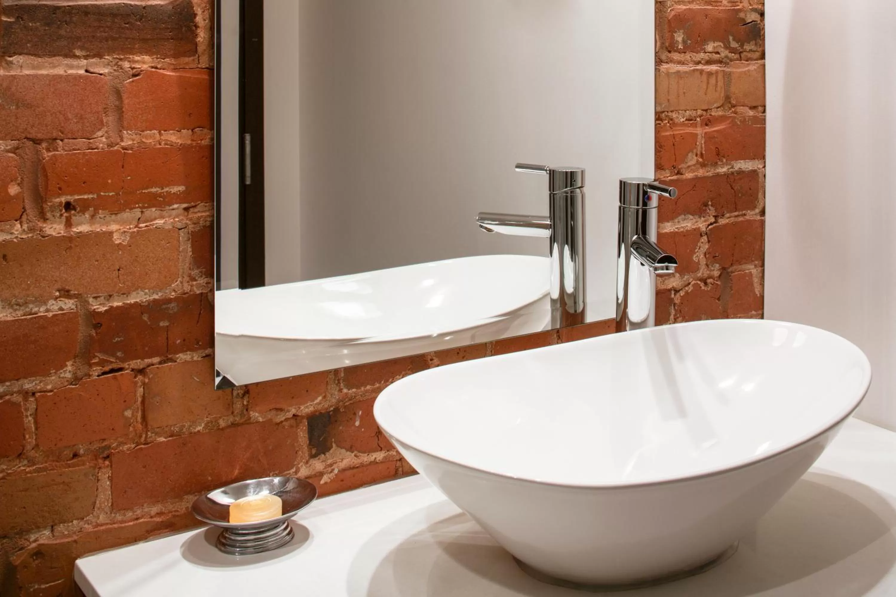 Bathroom in Auberge du Vieux Port by Gray Collection