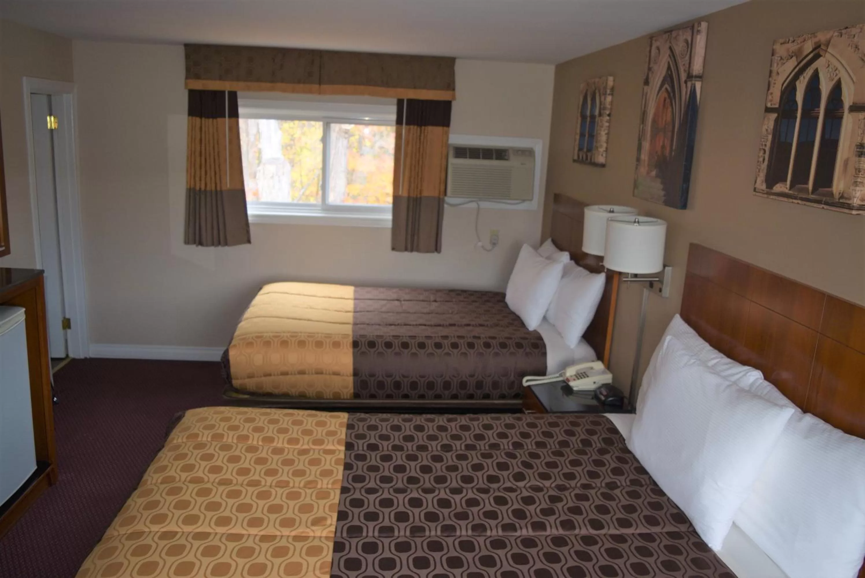 Bed in Knights Inn Arnprior