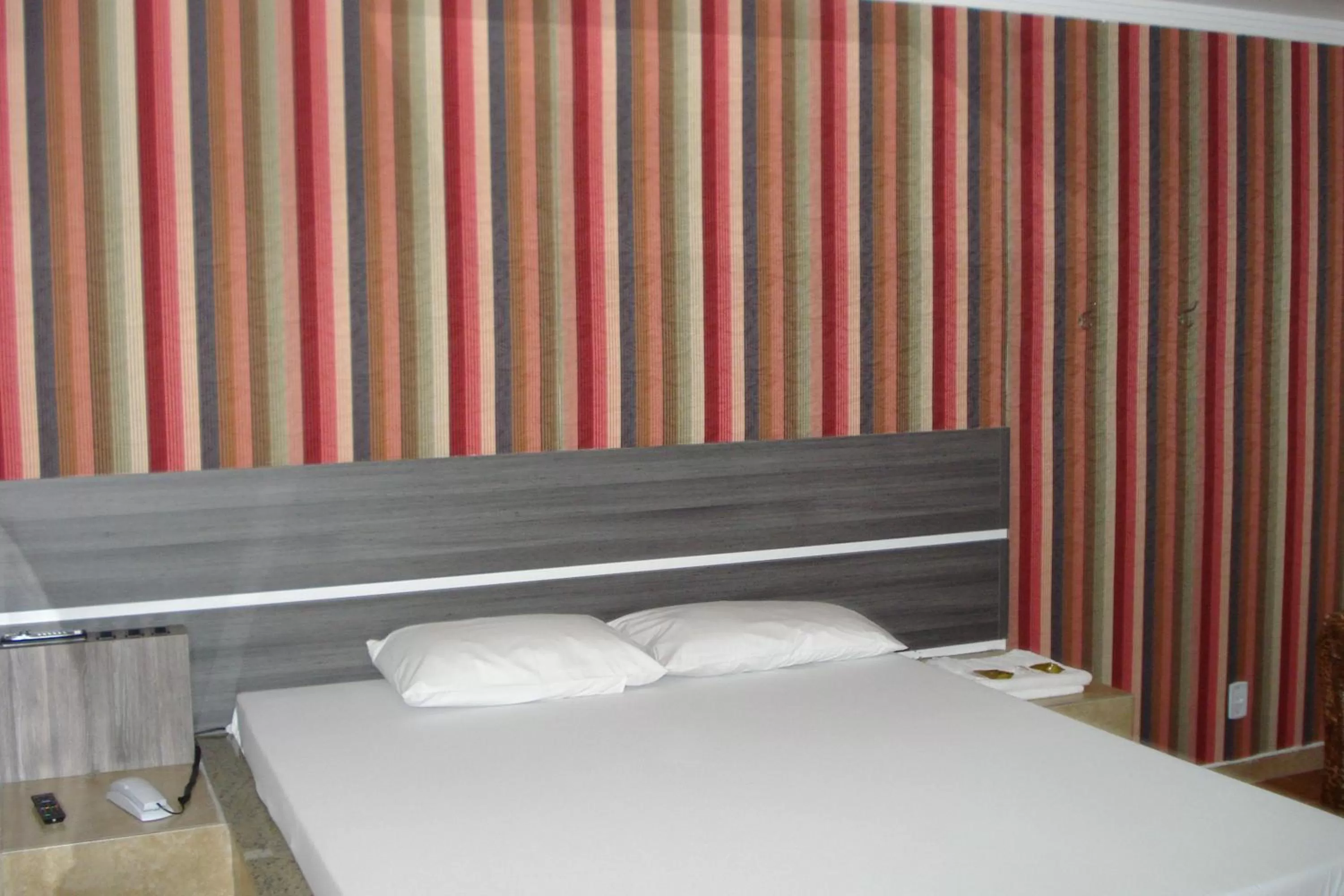 Bedroom in Classic Hotel e Motel