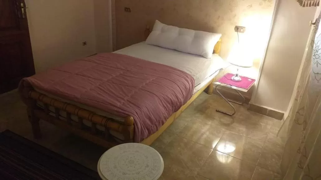 Bed in pyramid Giza city inn