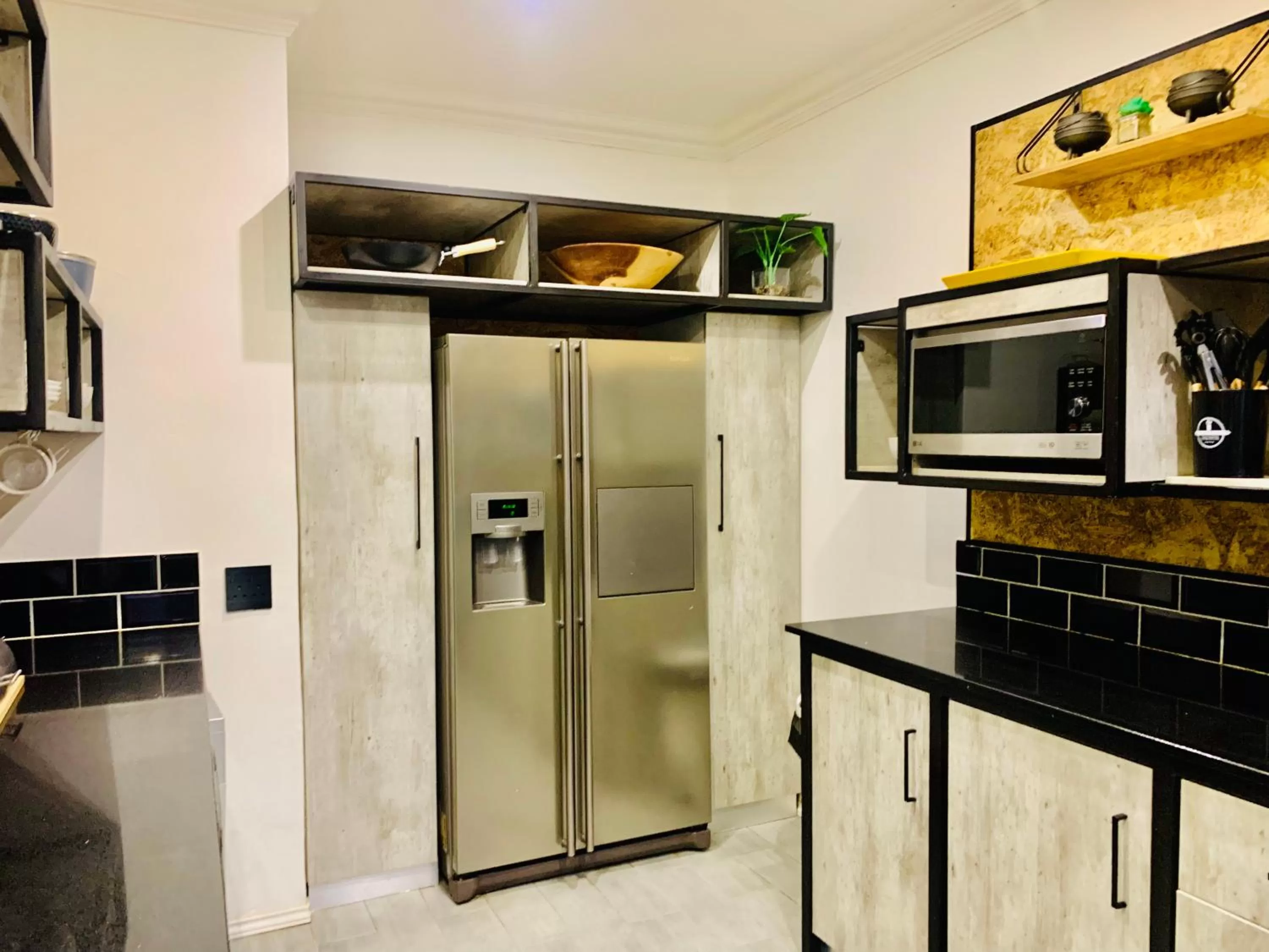 Kitchen/Kitchenette in 24 On Basil Inventive suites