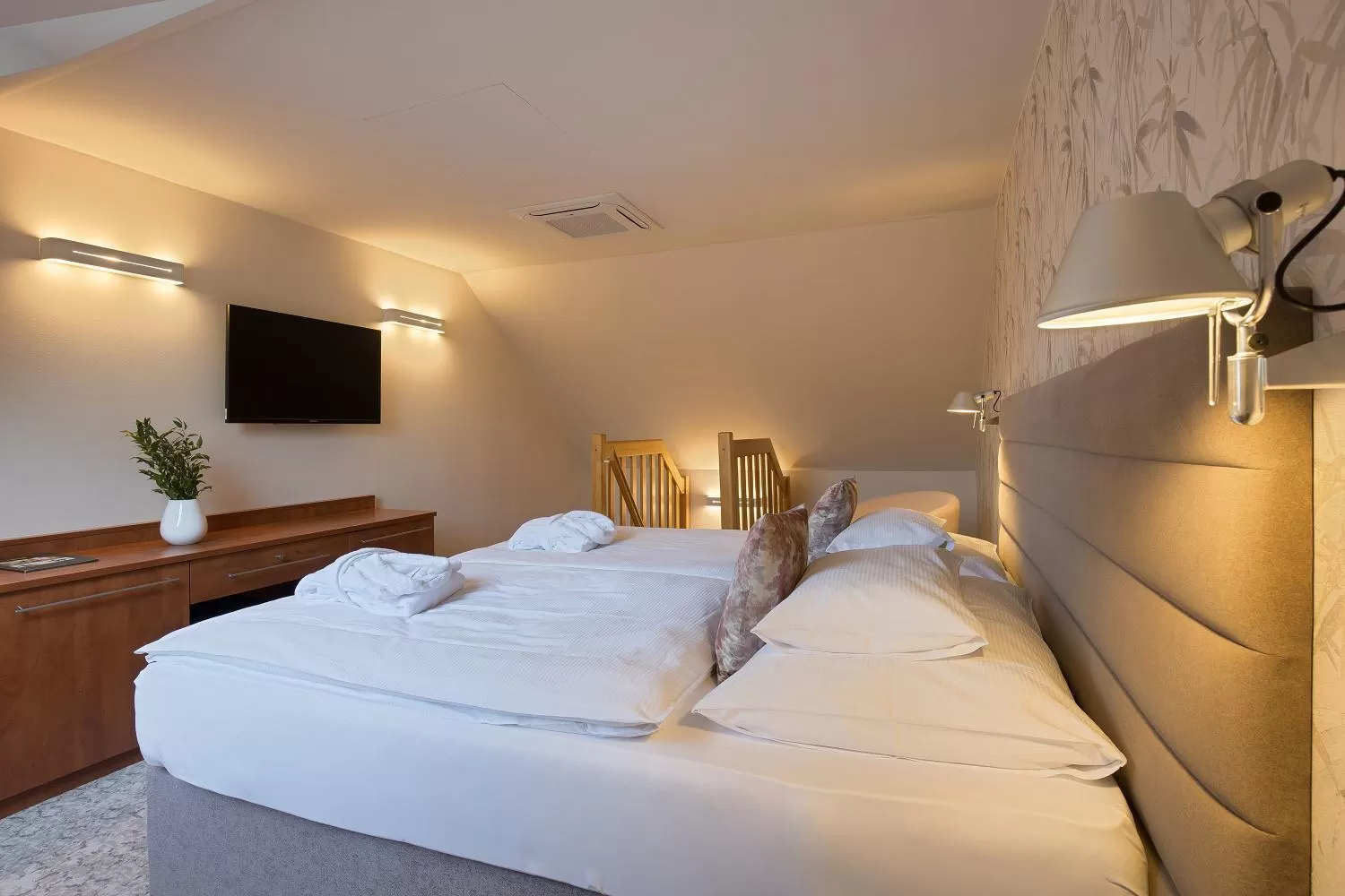 Bed in Equitana Hotel Resort