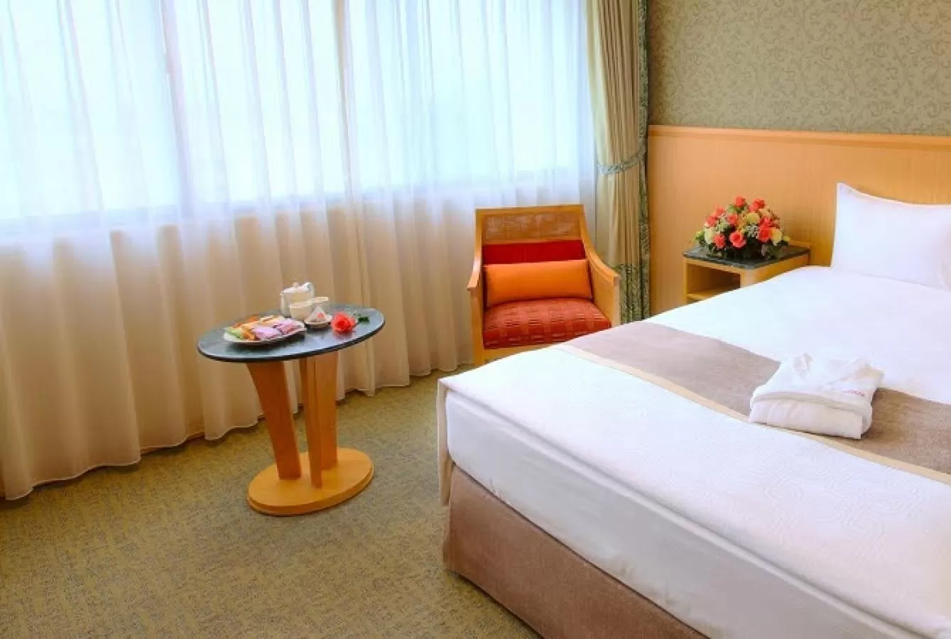 Photo of the whole room, Bed in Chateau de Chine Hotel Hualien