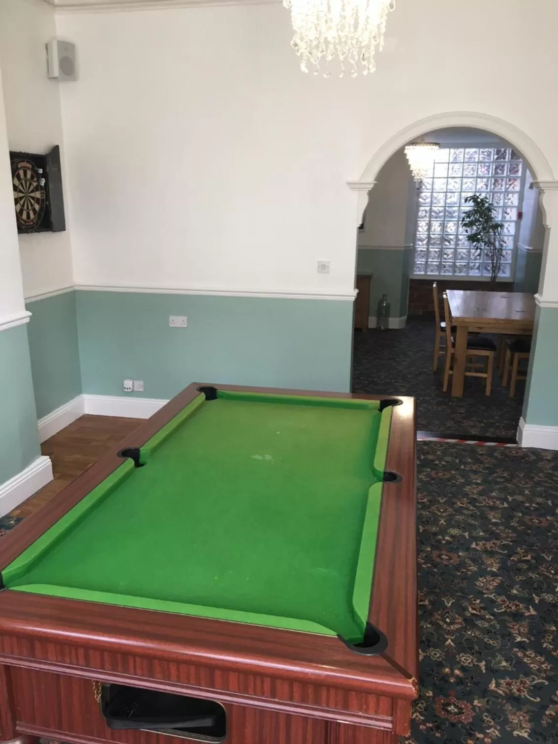 Communal lounge/ TV room in The Beacon Hotel