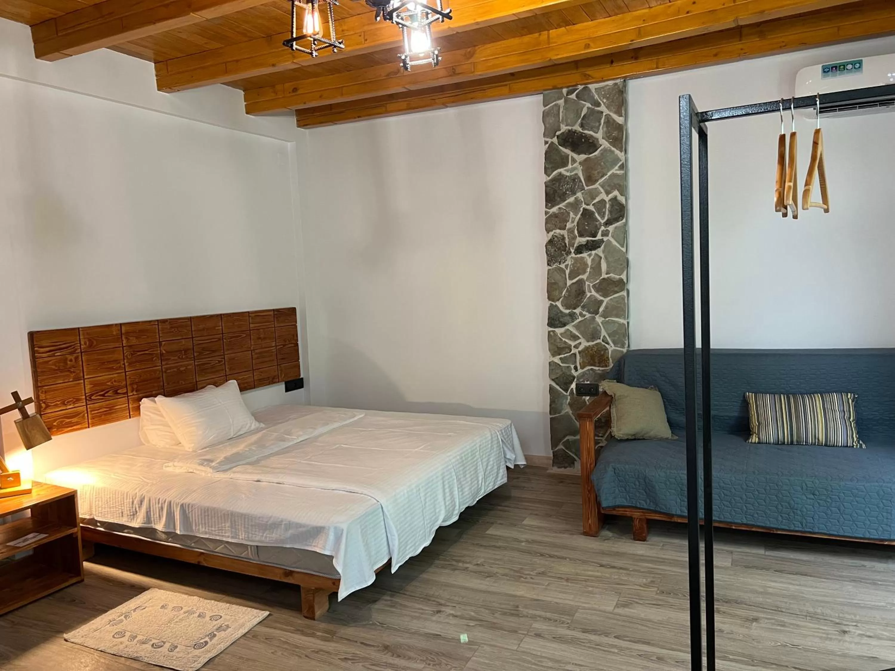 Bed in Green Stone Boutique Hotel