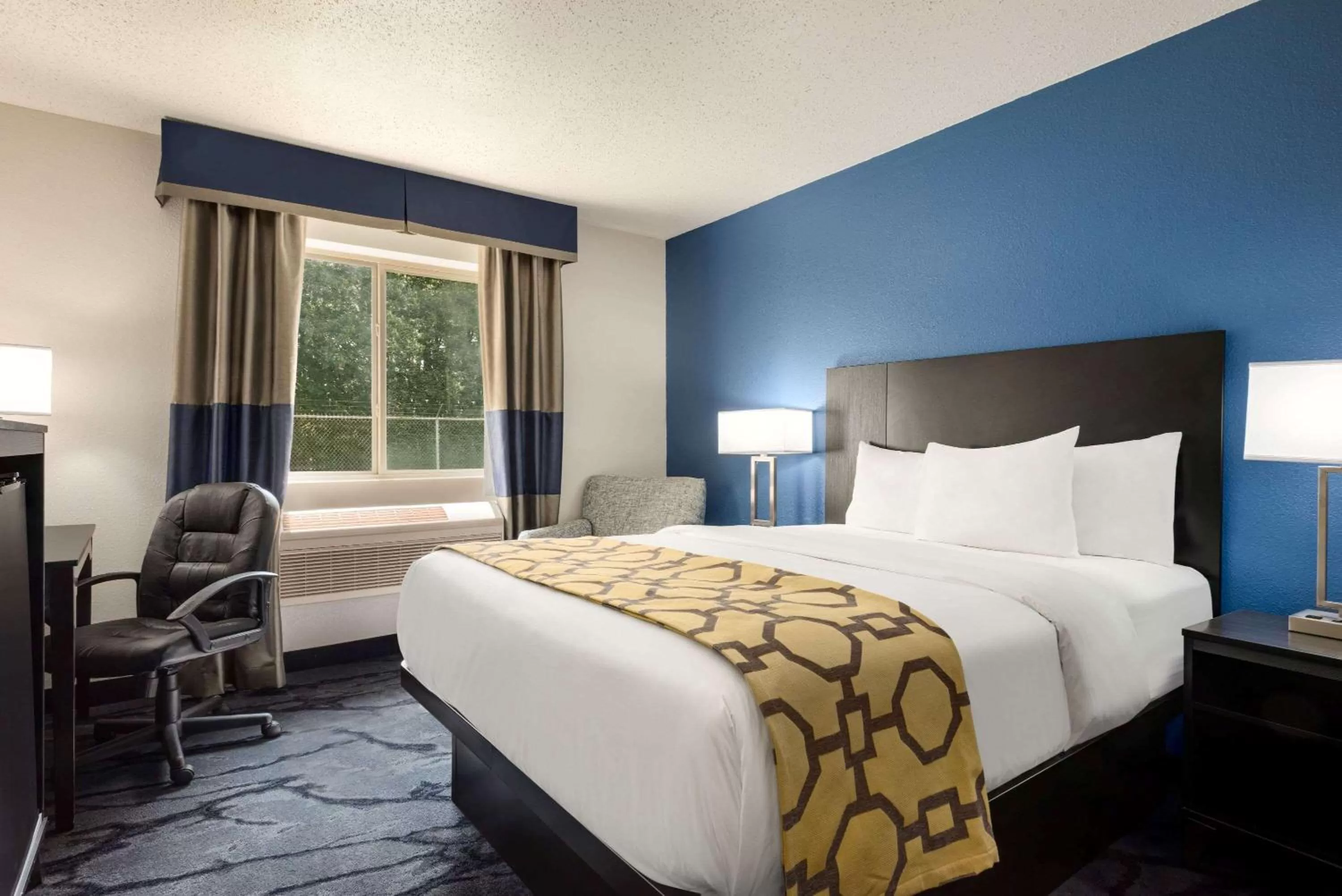 Photo of the whole room, Bed in Baymont by Wyndham Swanton