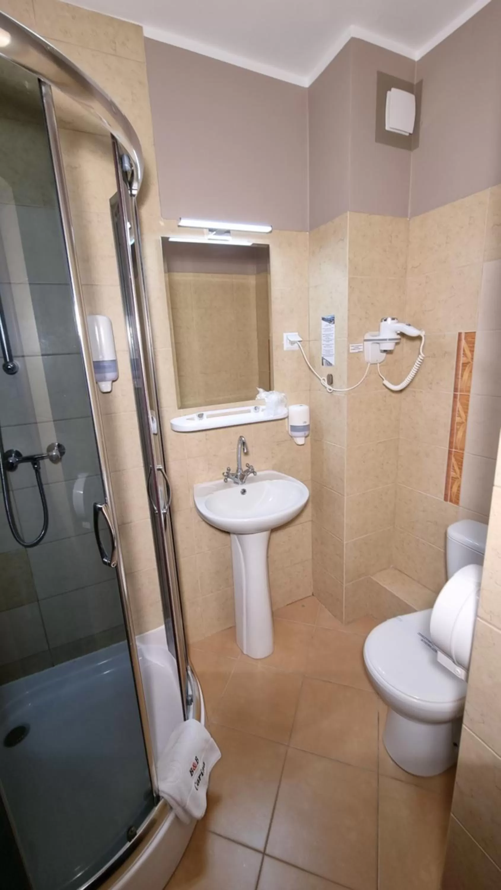 Bathroom in Carina Hotel