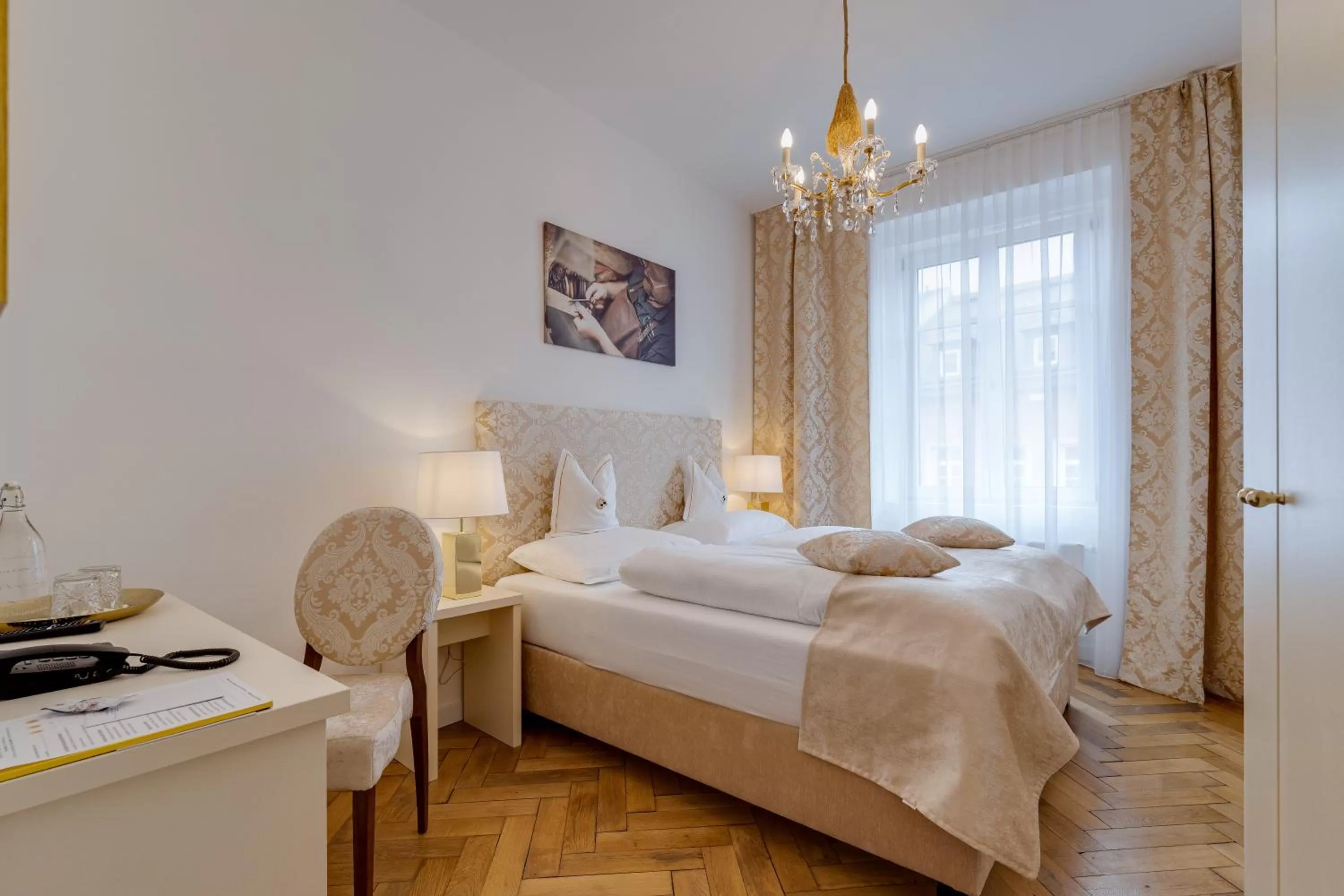 Photo of the whole room, Bed in Boutique Hotel Goldenes Lamm Villach