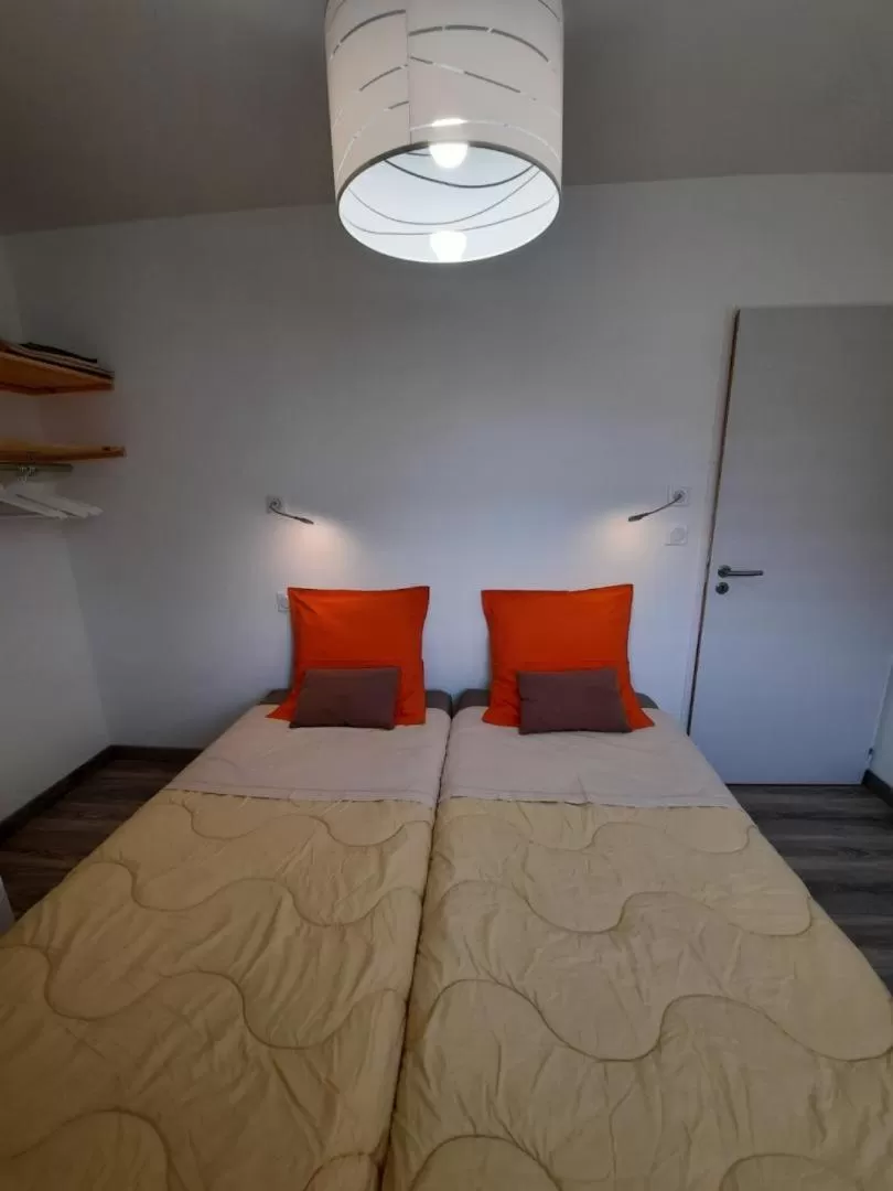 Bed in AGATHE chambres d'hôtes