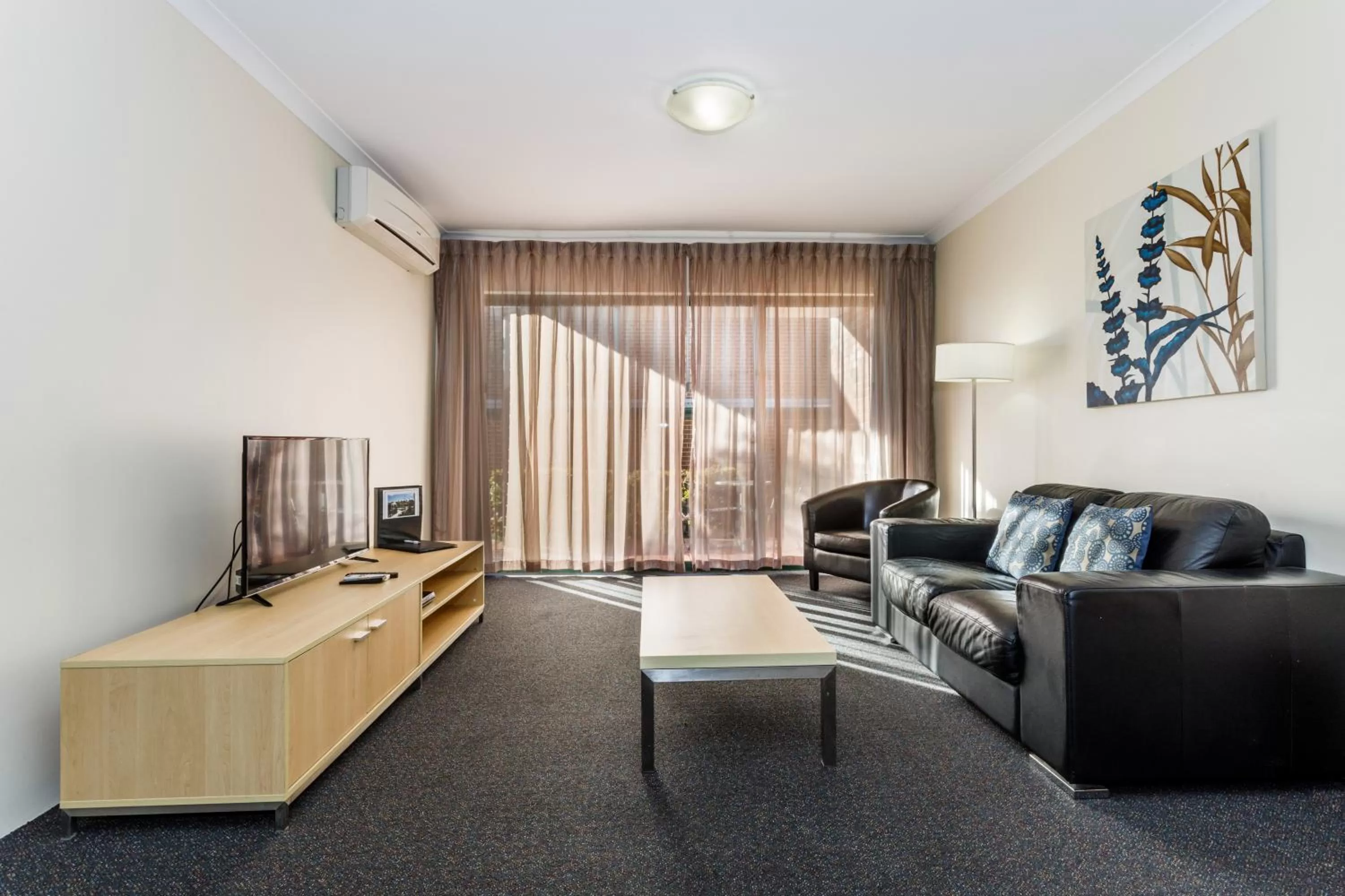 Living room in Perth Ascot Central Apartment Hotel Official