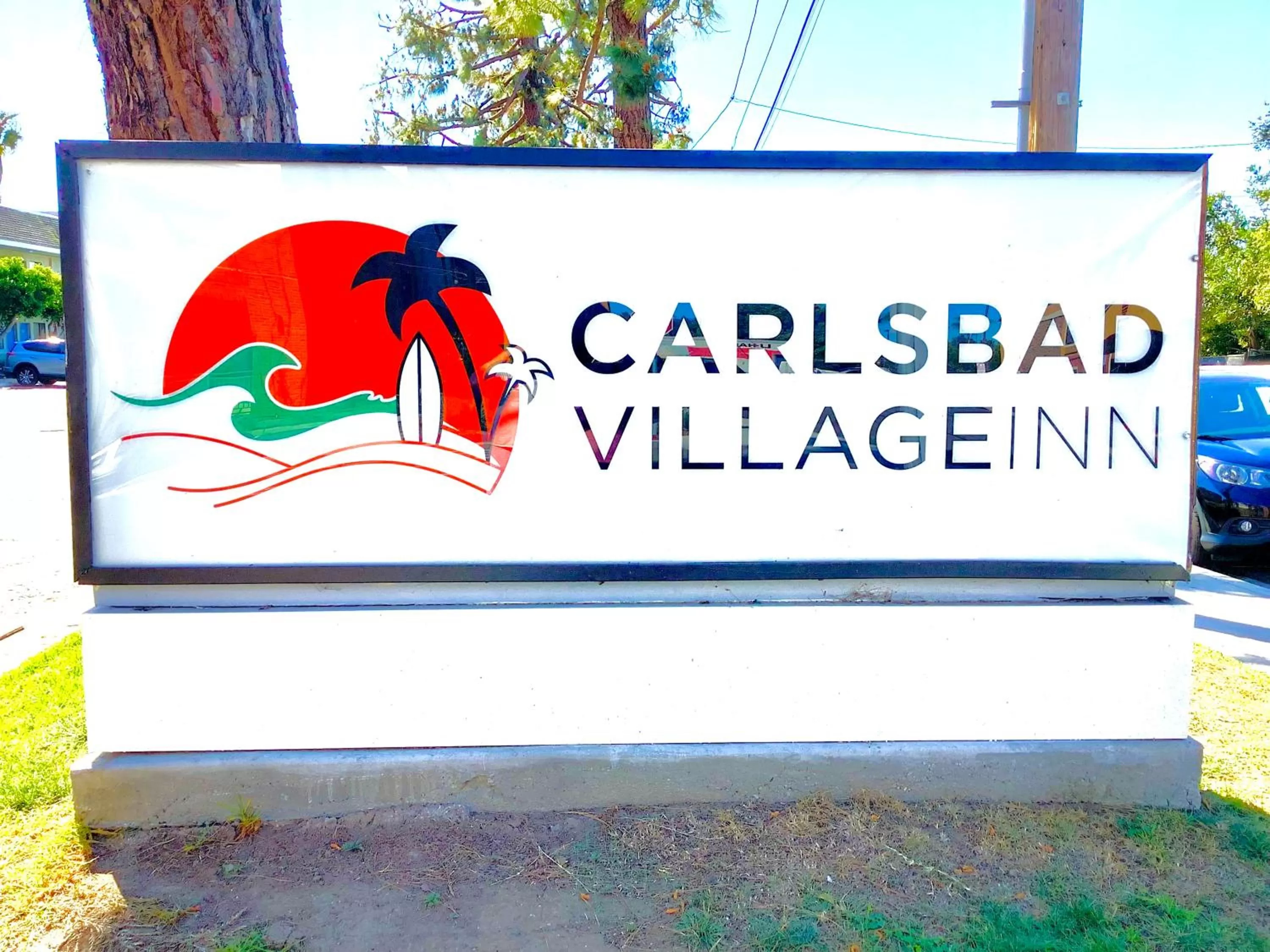 Property logo or sign in Carlsbad Village Inn