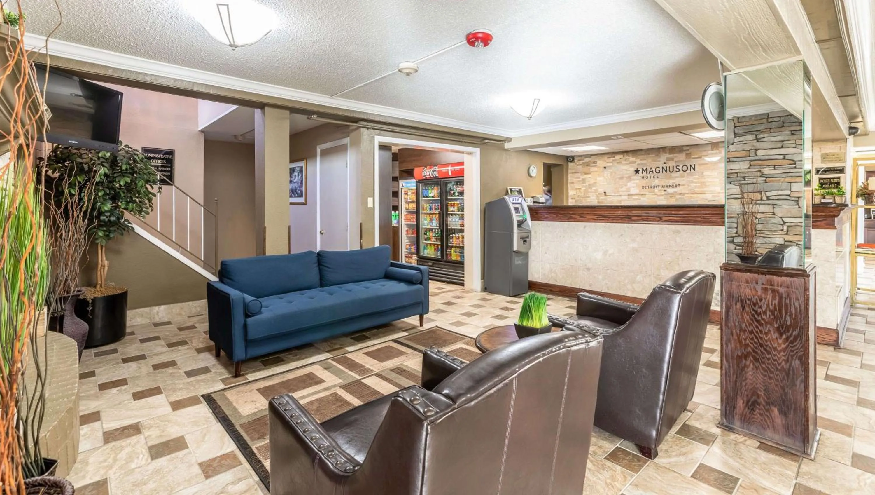 Lobby or reception in Magnuson Hotel Detroit Airport