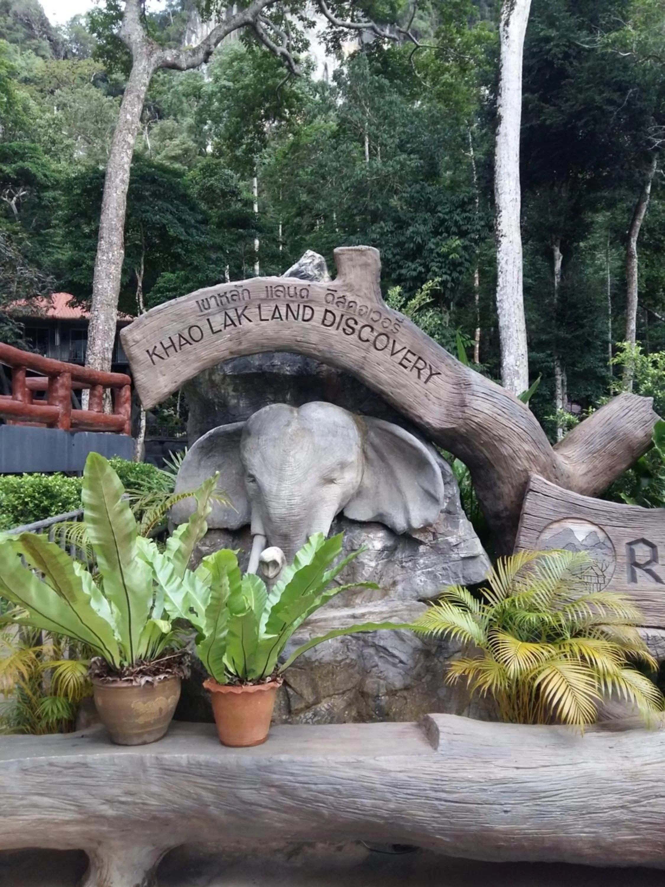 Property logo or sign in Rock and Tree House Resort