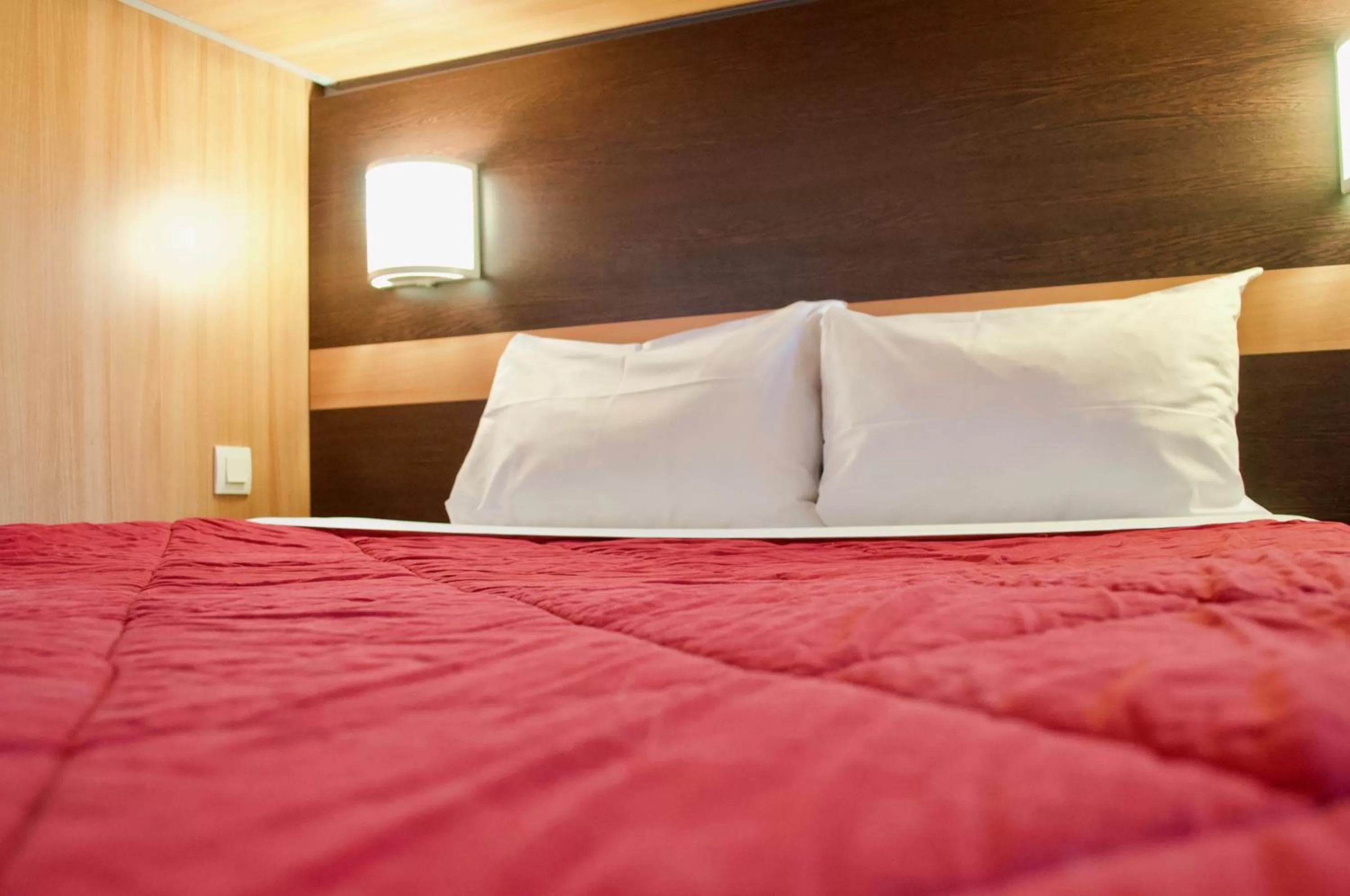 Bedroom in Premiere Classe Bordeaux Sud Pessac Bersol