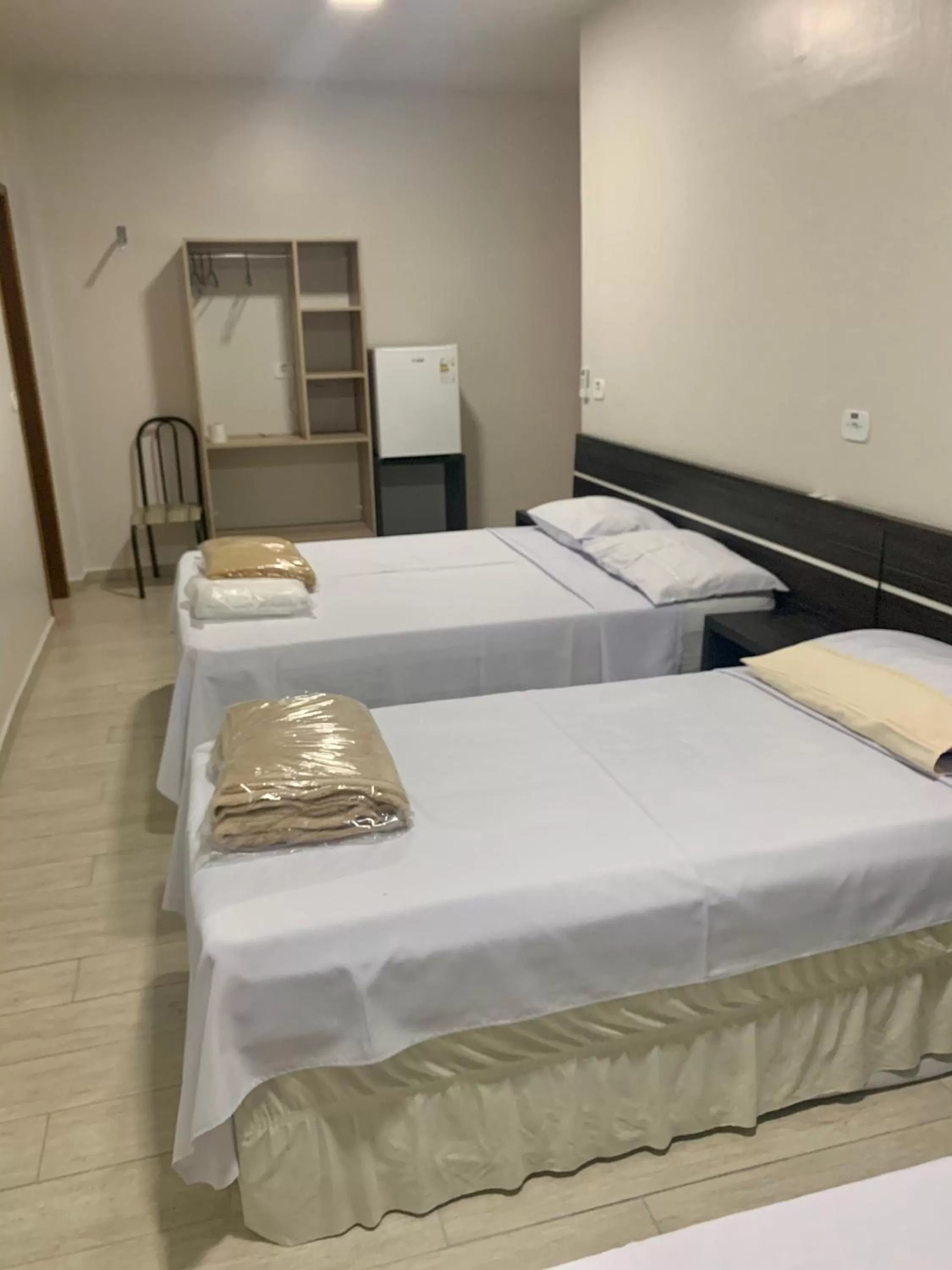 Bed in Hotel Paradizzo