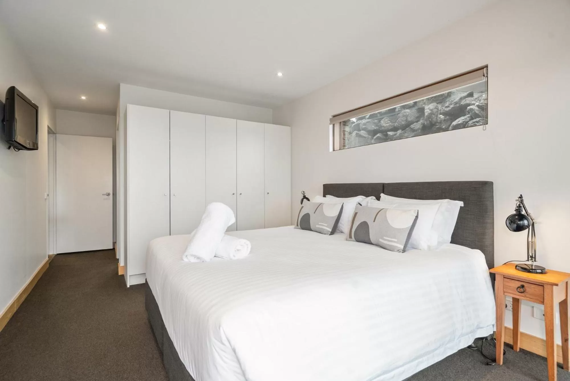 Bedroom in Alpine Woodsmoke Apartments
