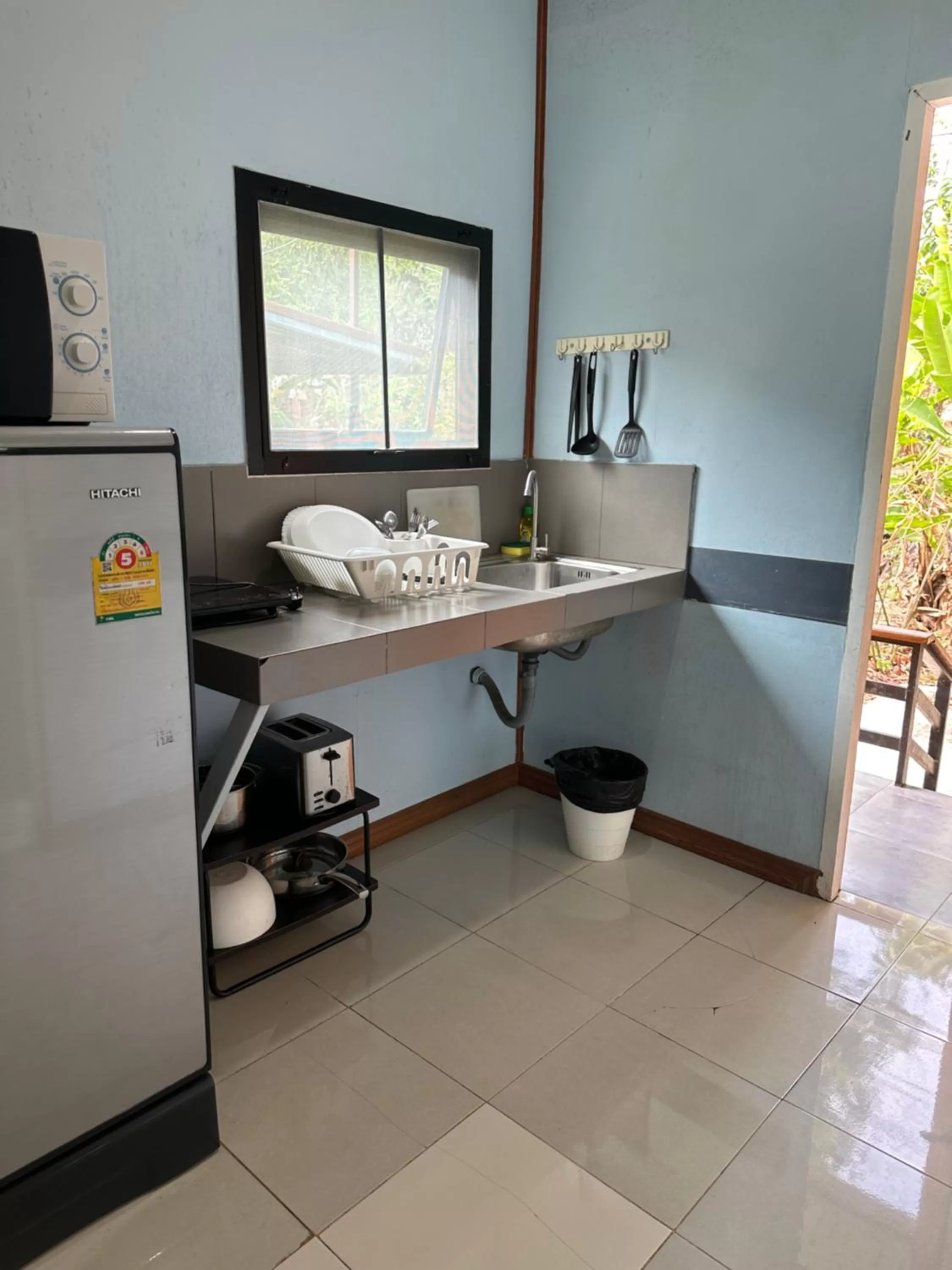 Kitchen or kitchenette, Bathroom in Fine Times Resort