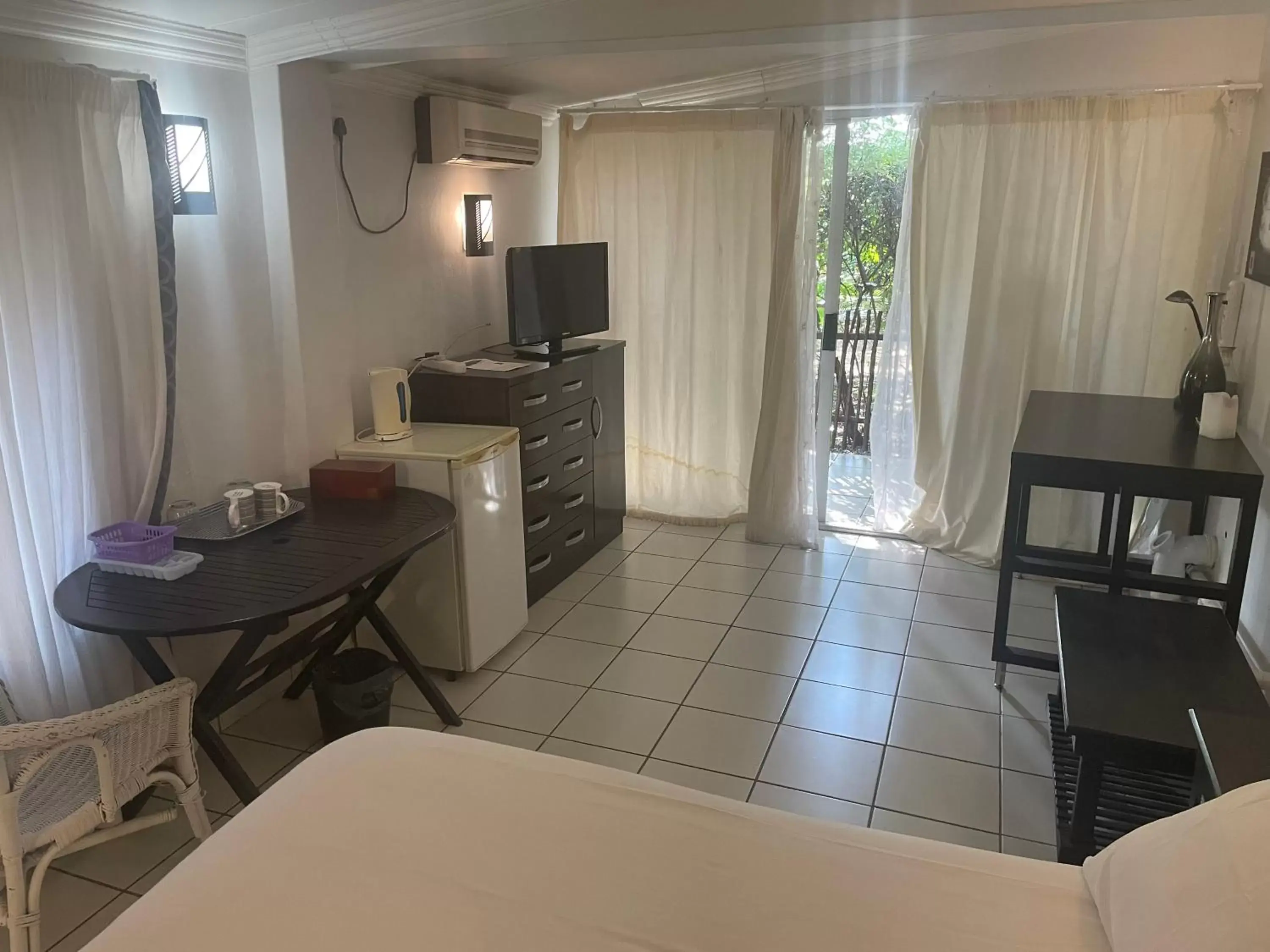 Deluxe Double Room with Balcony - single occupancy in Rosscos Lodge Deluxe Double Room with Balcony - single occupancy in Rosscos Lodge