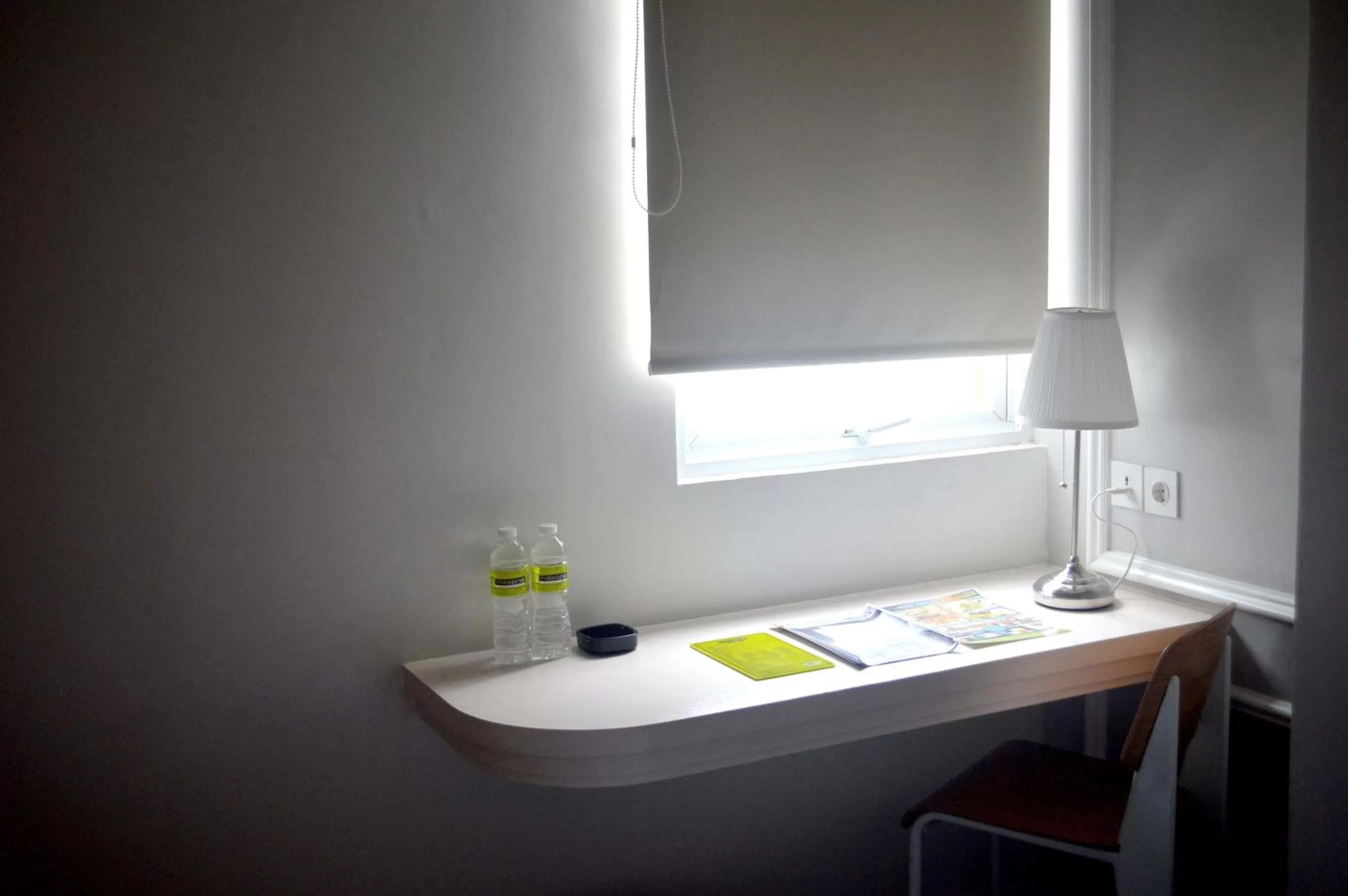 Seating area in MaxOne Signature Glodok Jakarta