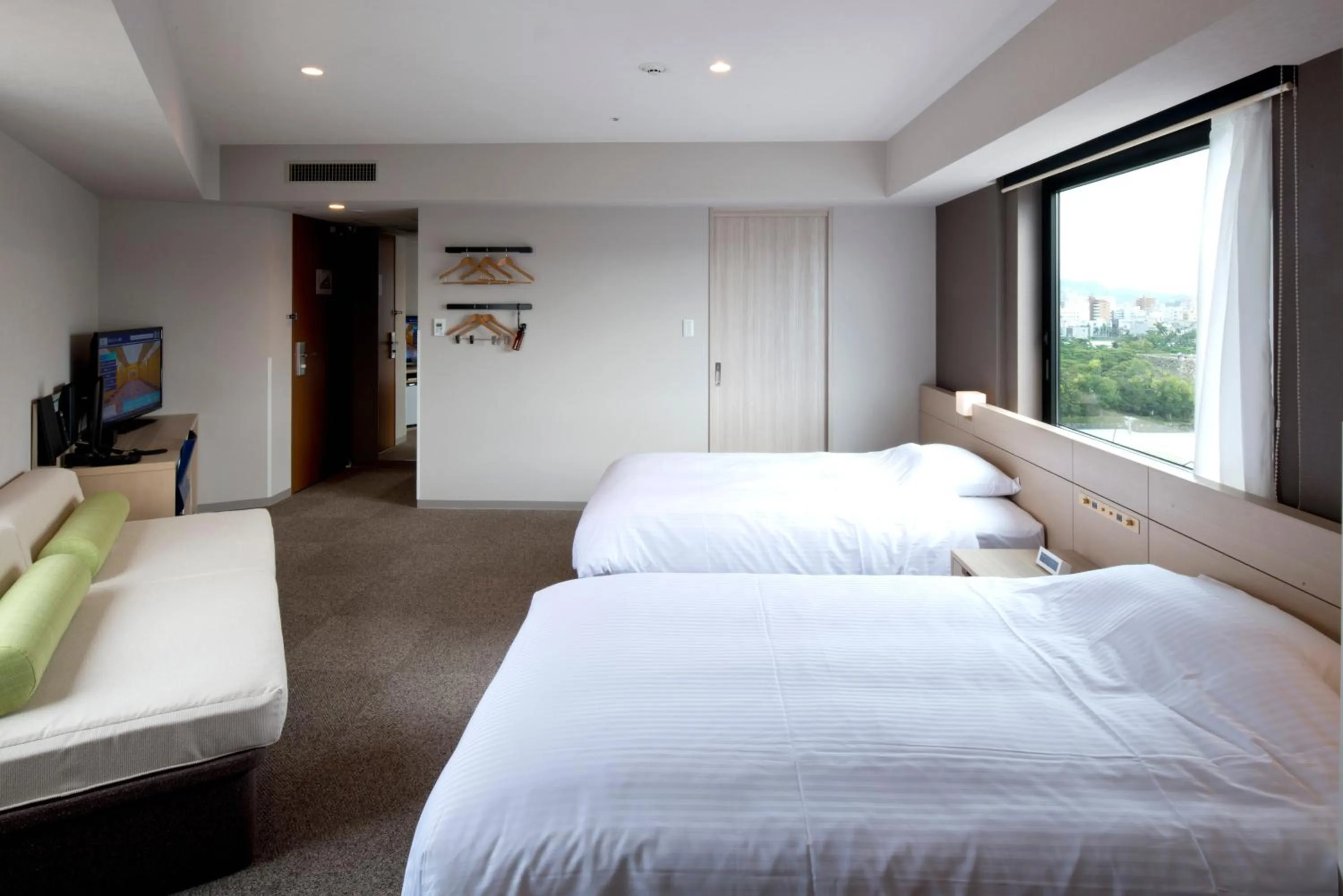 Photo of the whole room, Bed in JR Clement Inn Takamatsu