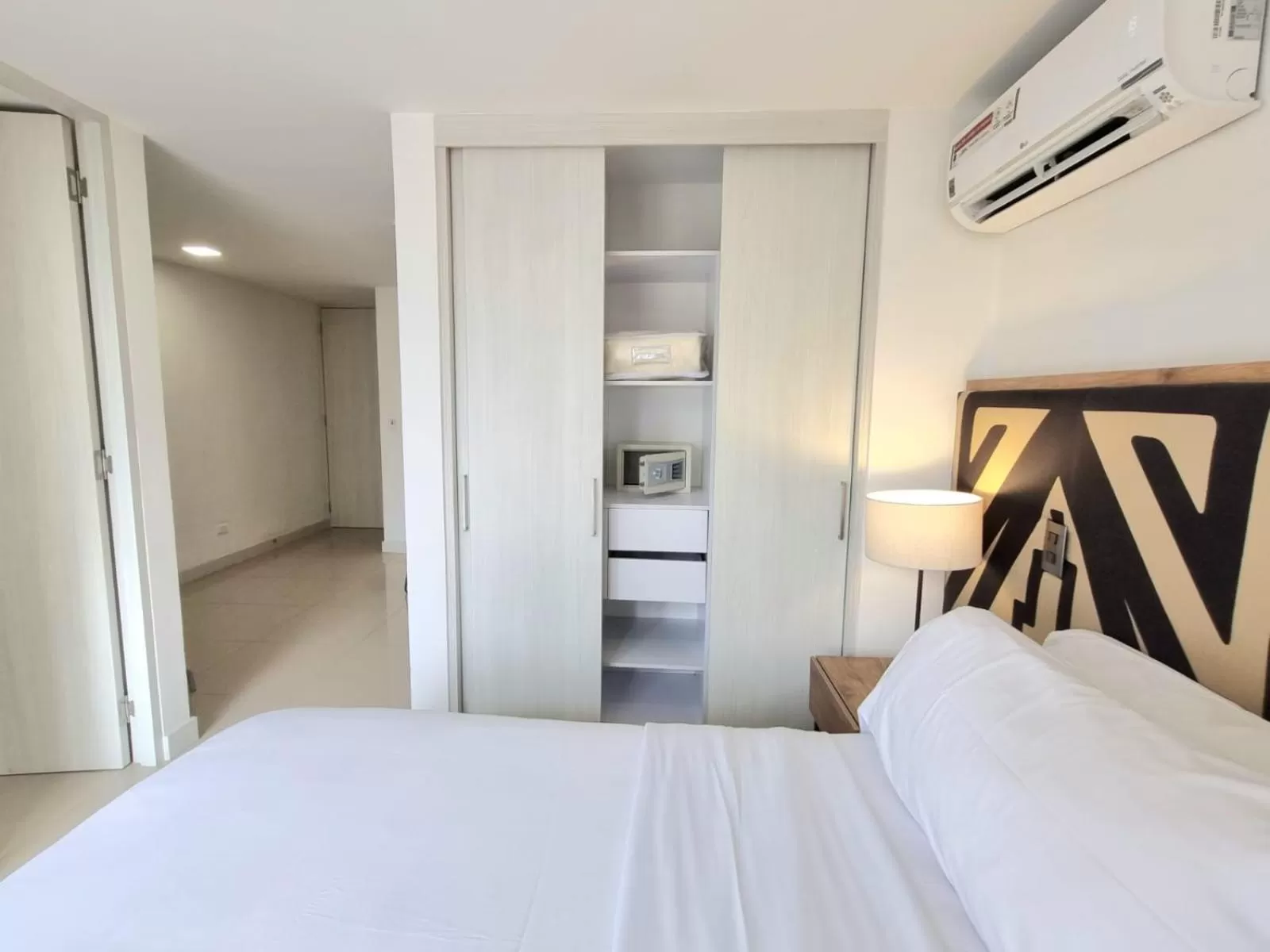 Bed in Origen Local Suites