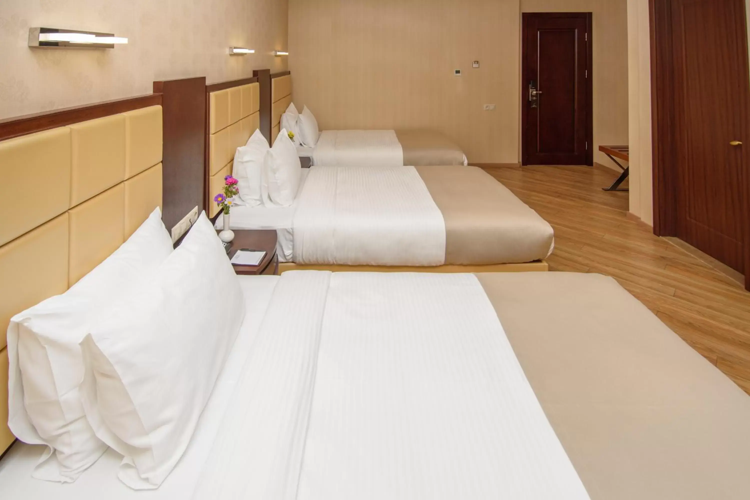 Standard Triple Room in KMM Hotel Standard Triple Room in KMM Hotel