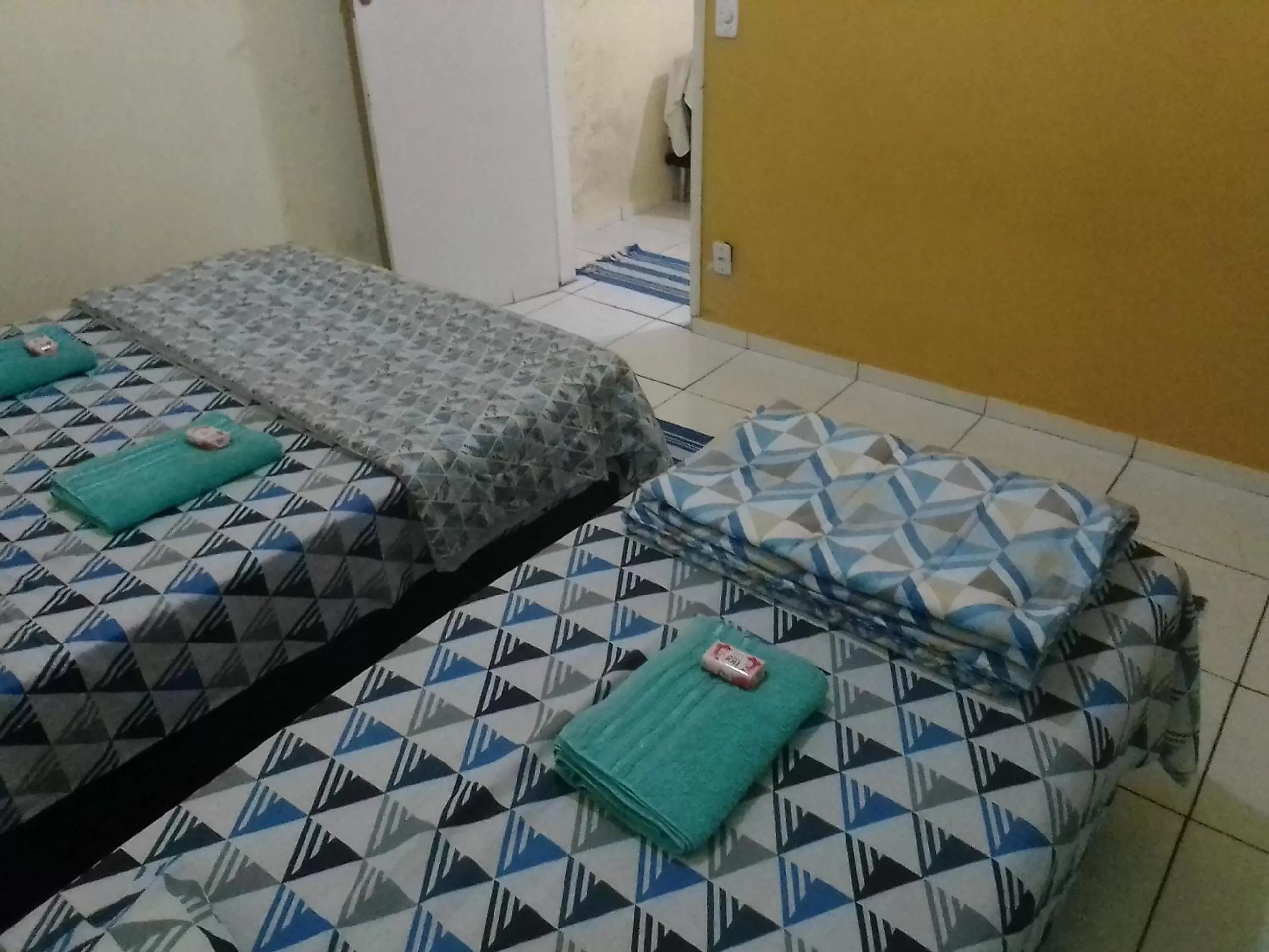 Bed in Hospedagem Pousada Fantasia Paraty