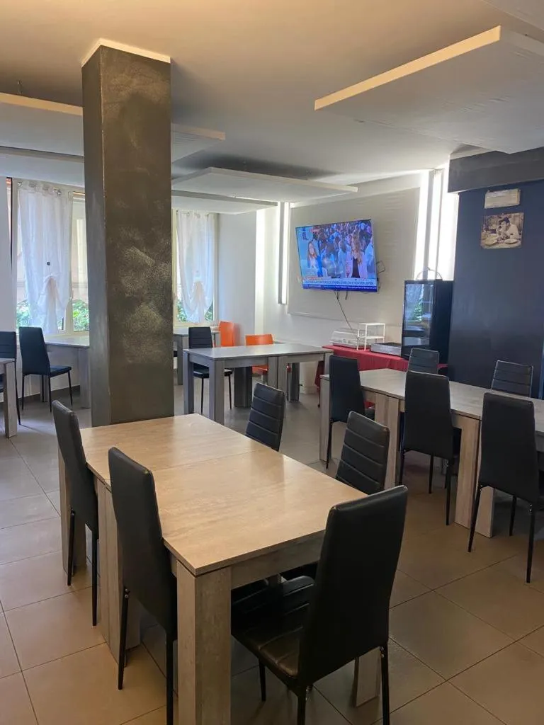 Communal lounge/ TV room in Hotel Verdina