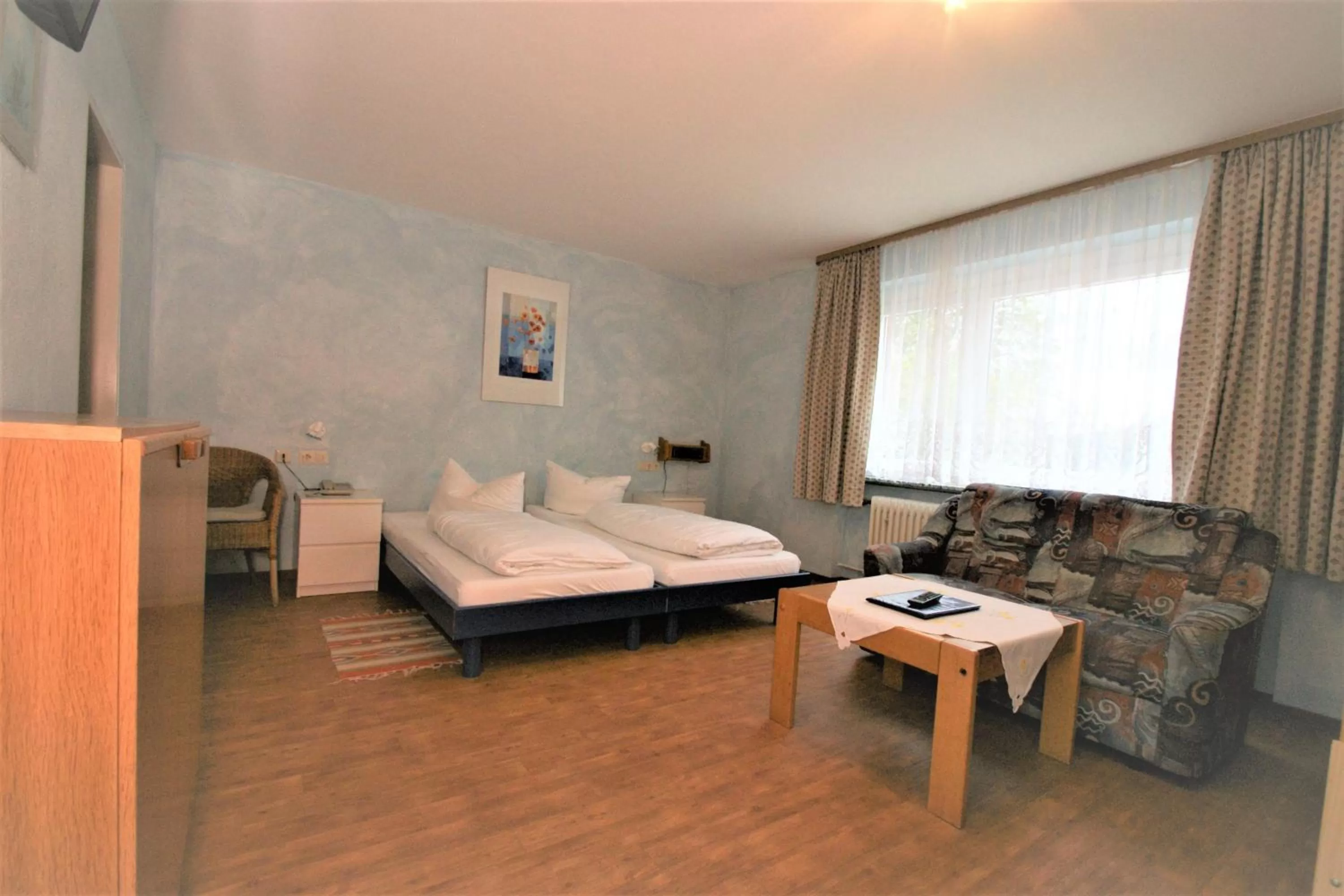 Photo of the whole room, Bed in ZUR TRAUBE Schwarzwaldhotel & Restaurant am Titisee