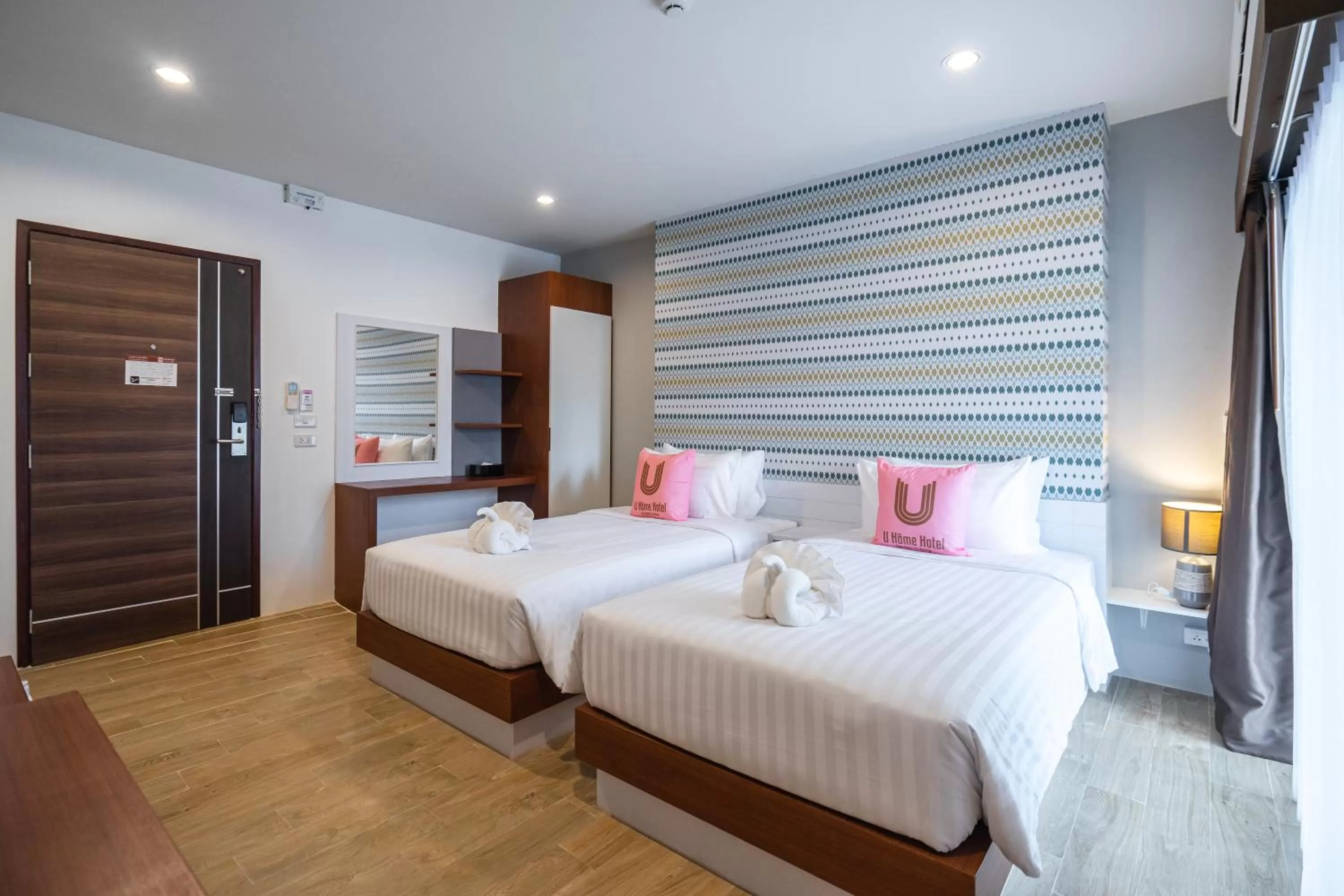 Bed in U- Homehotel Nakhonpanom