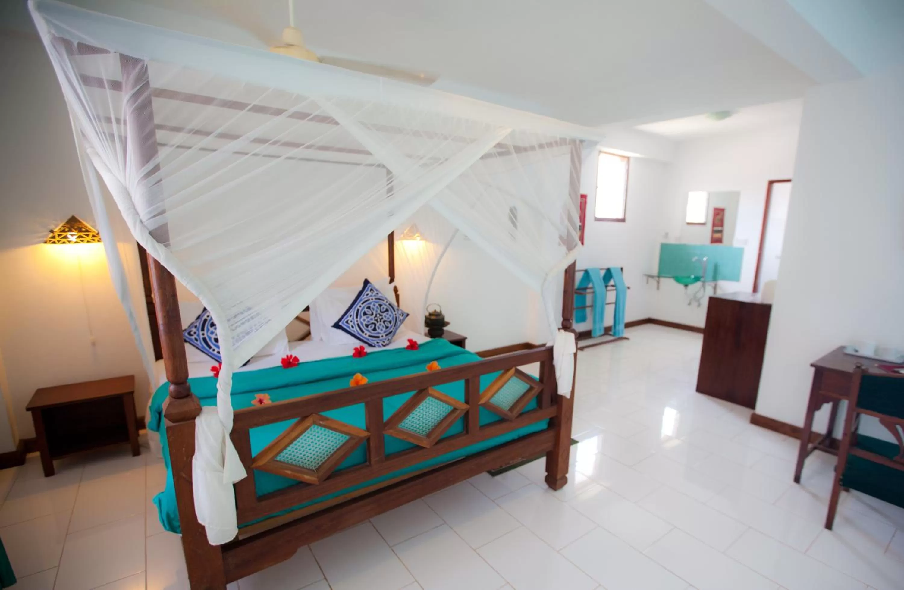 Bed in Flame Tree Cottages