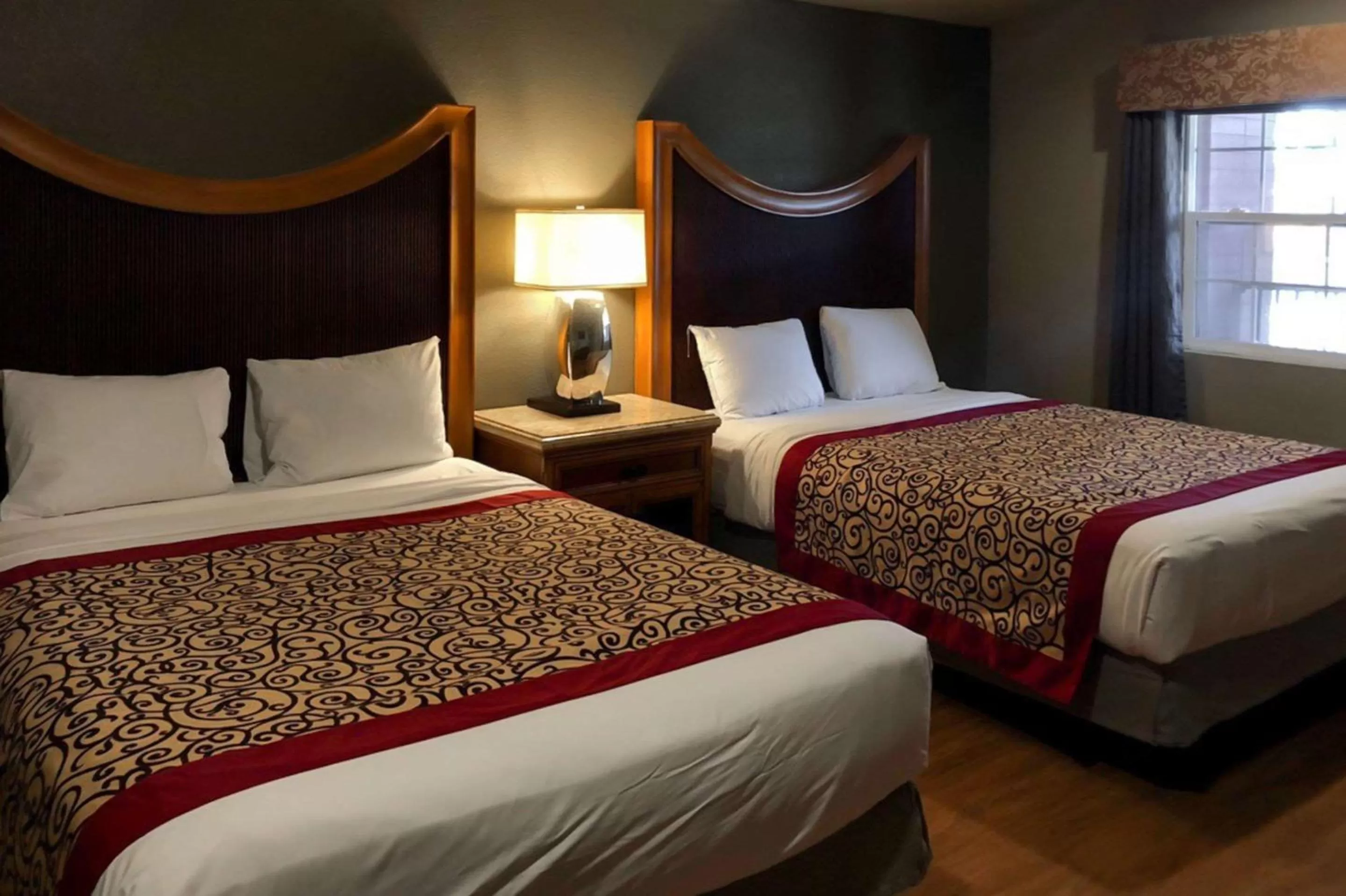 Photo of the whole room, Bed in Rodeway Inn Flagstaff East Route 66