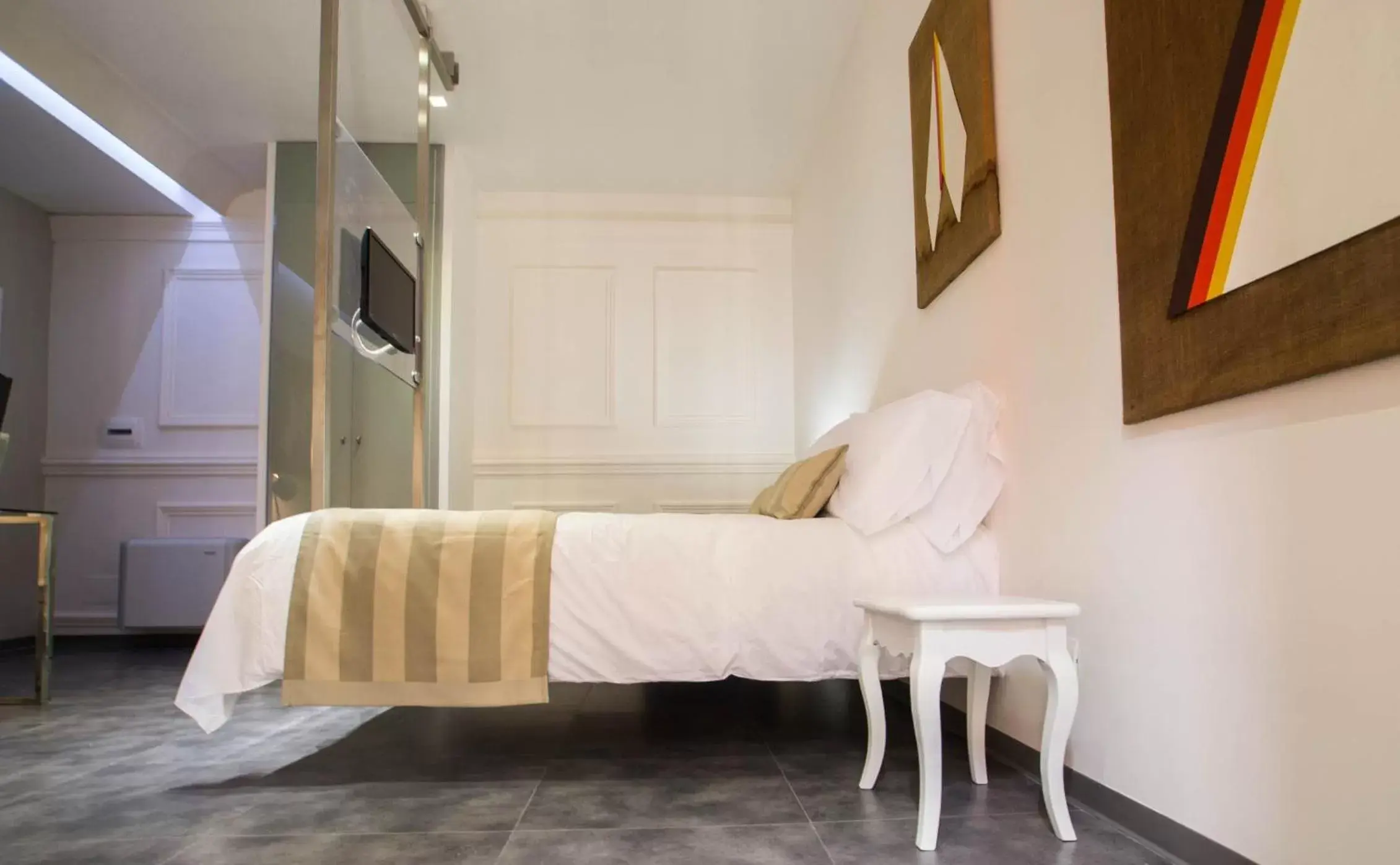 Deluxe Triple Room in Hotel Santa Brigida Deluxe Triple Room in Hotel Santa Brigida