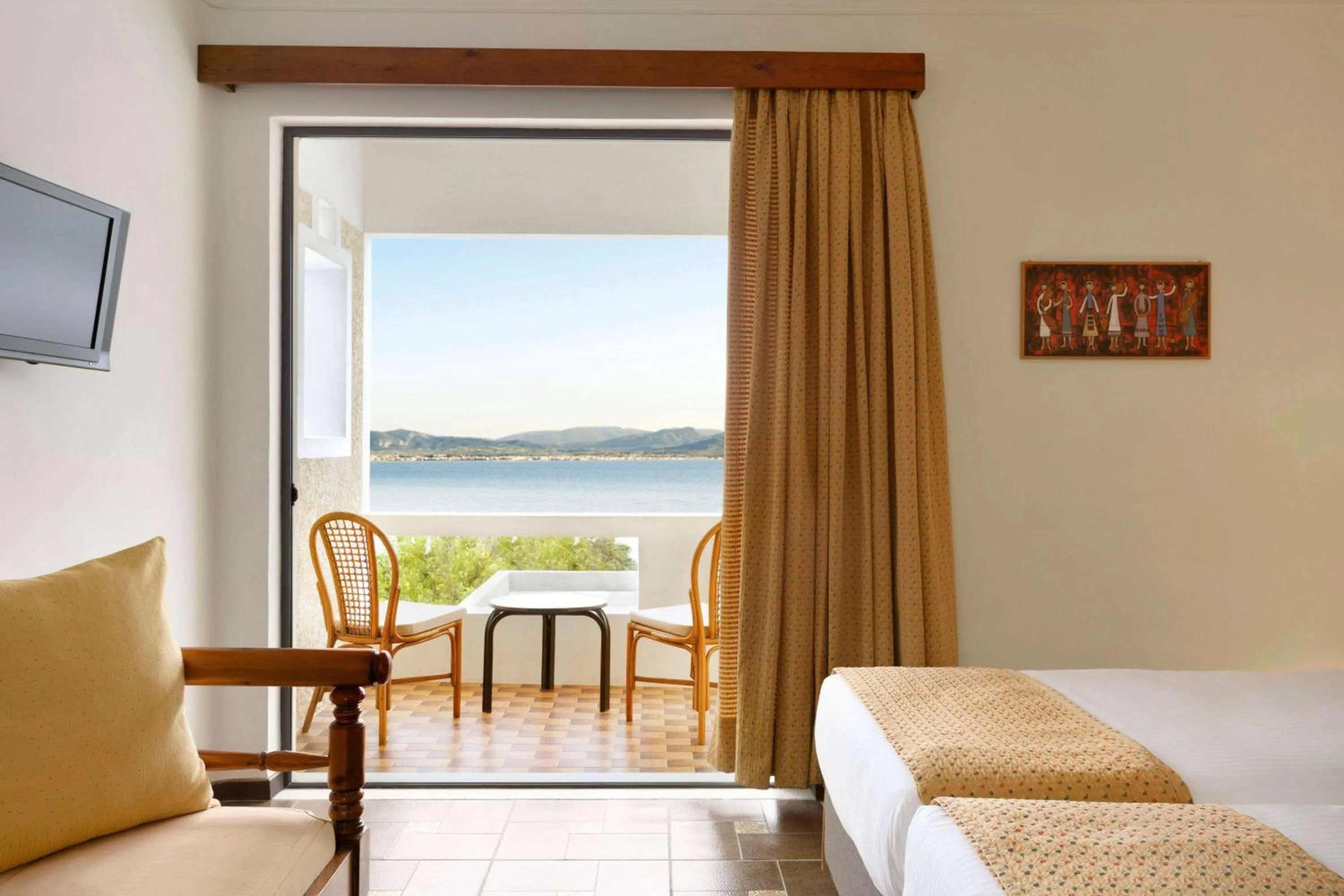 Photo of the whole room, Bed in Ramada Loutraki Poseidon Resort