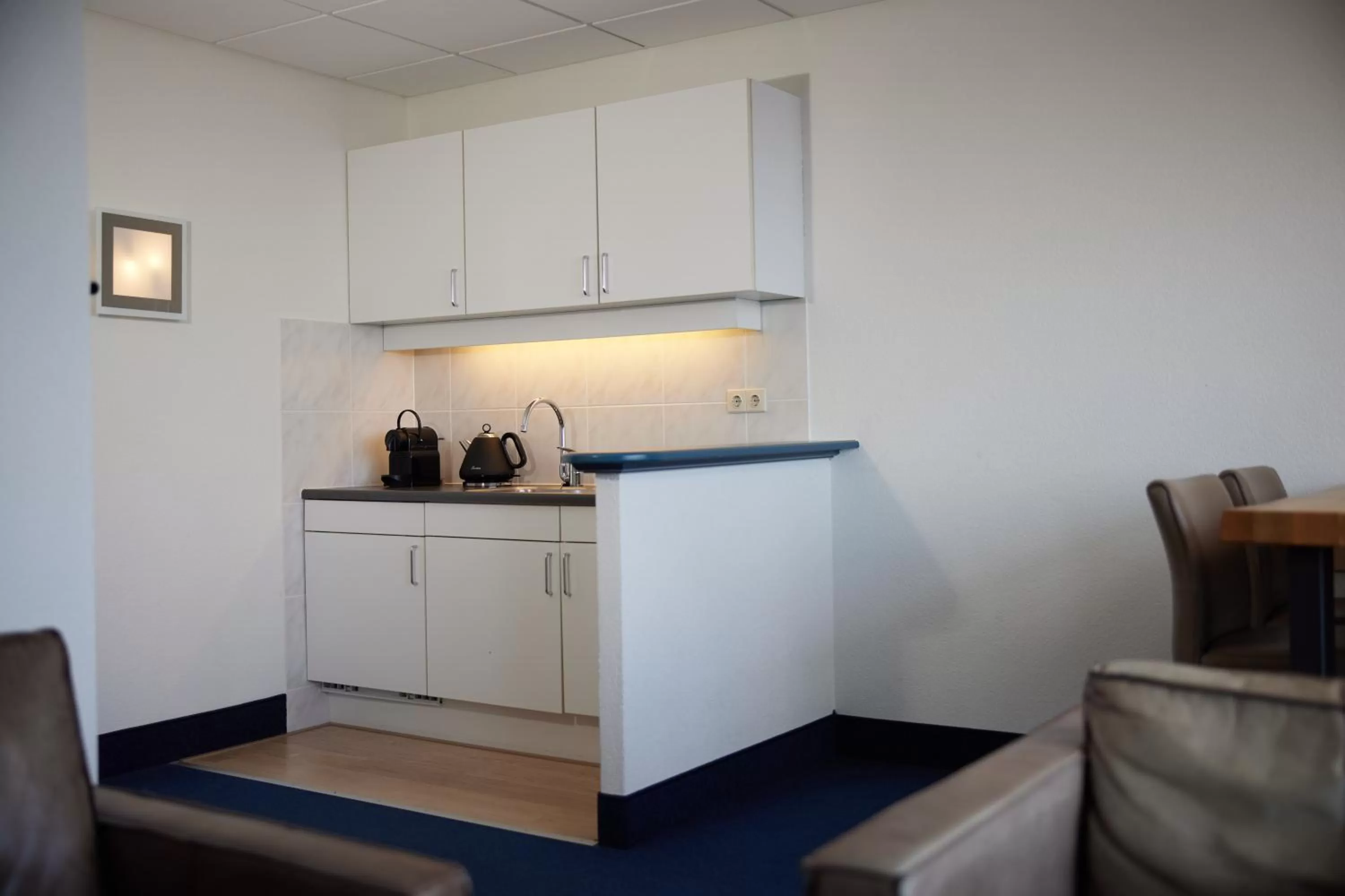 Kitchen or kitchenette in WestCord Hotel Schylge