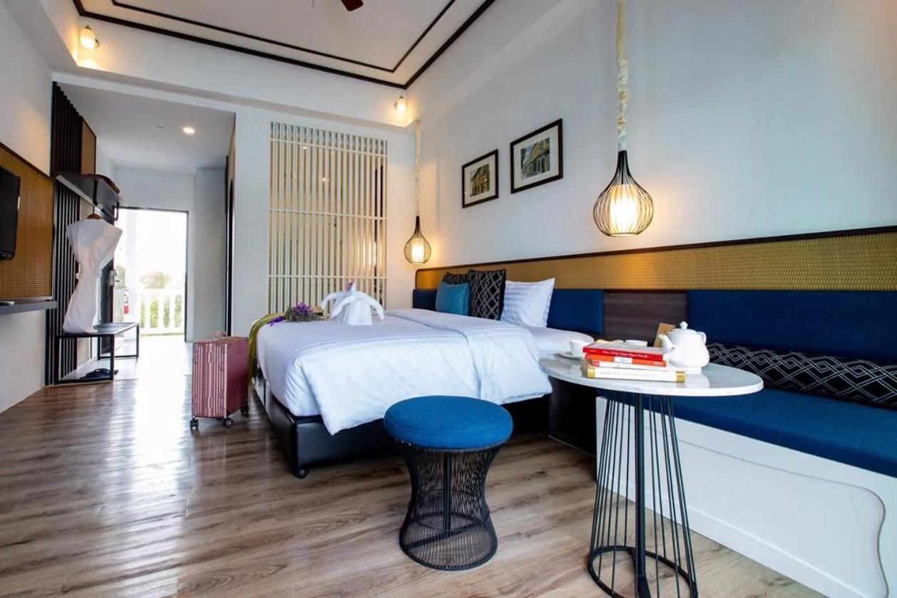 Bed in Chaanburi Boutique Resort