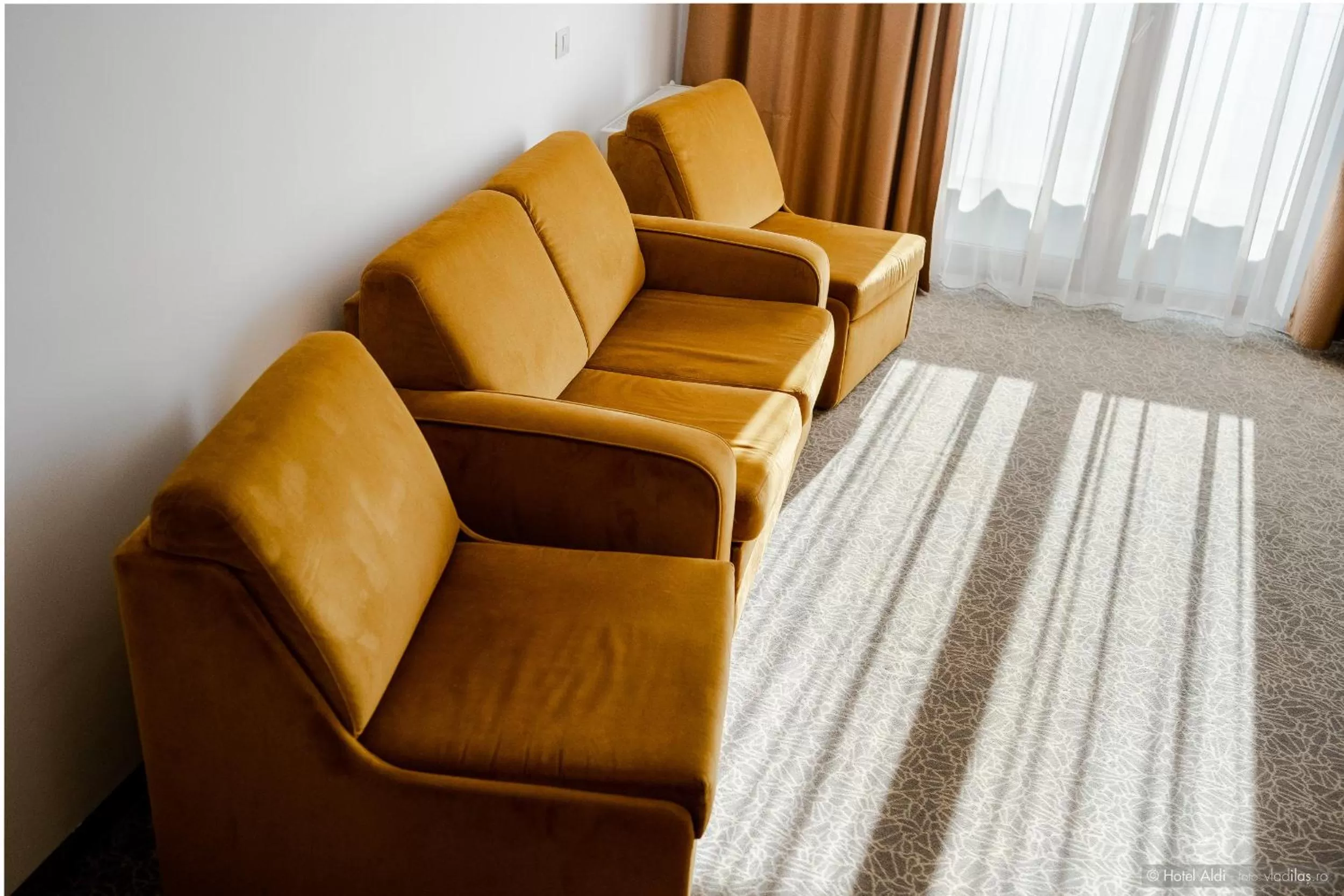 Seating area in Hotel Aldi